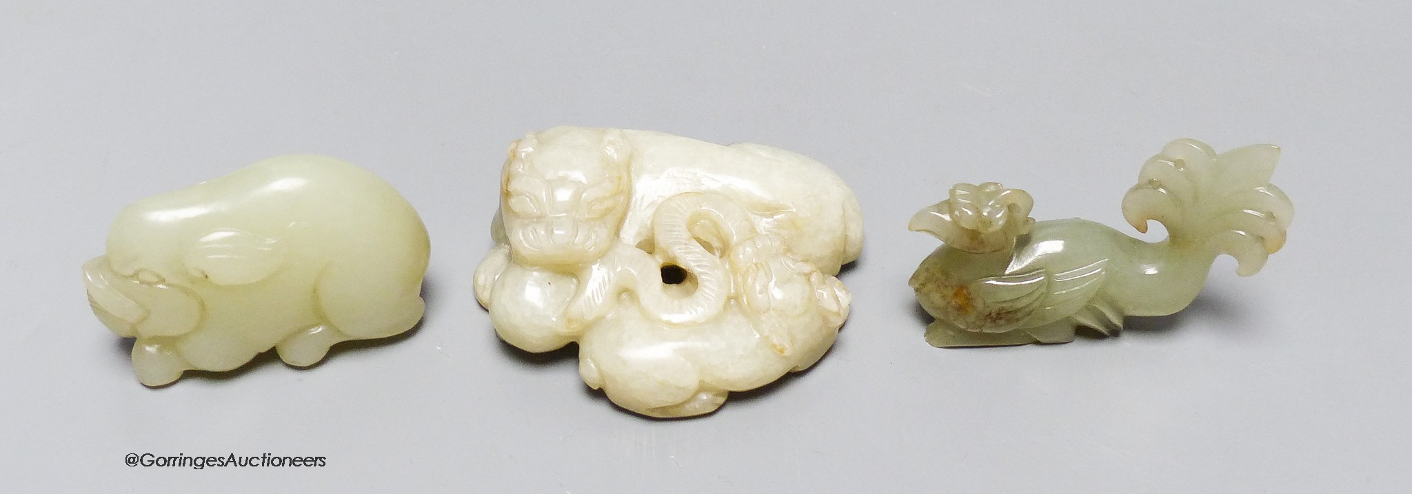 Three Chinese jade carvings of a wild cat and cub, a pig and a phoenix, 5.4 - 6.2cm                                                                                                                                         