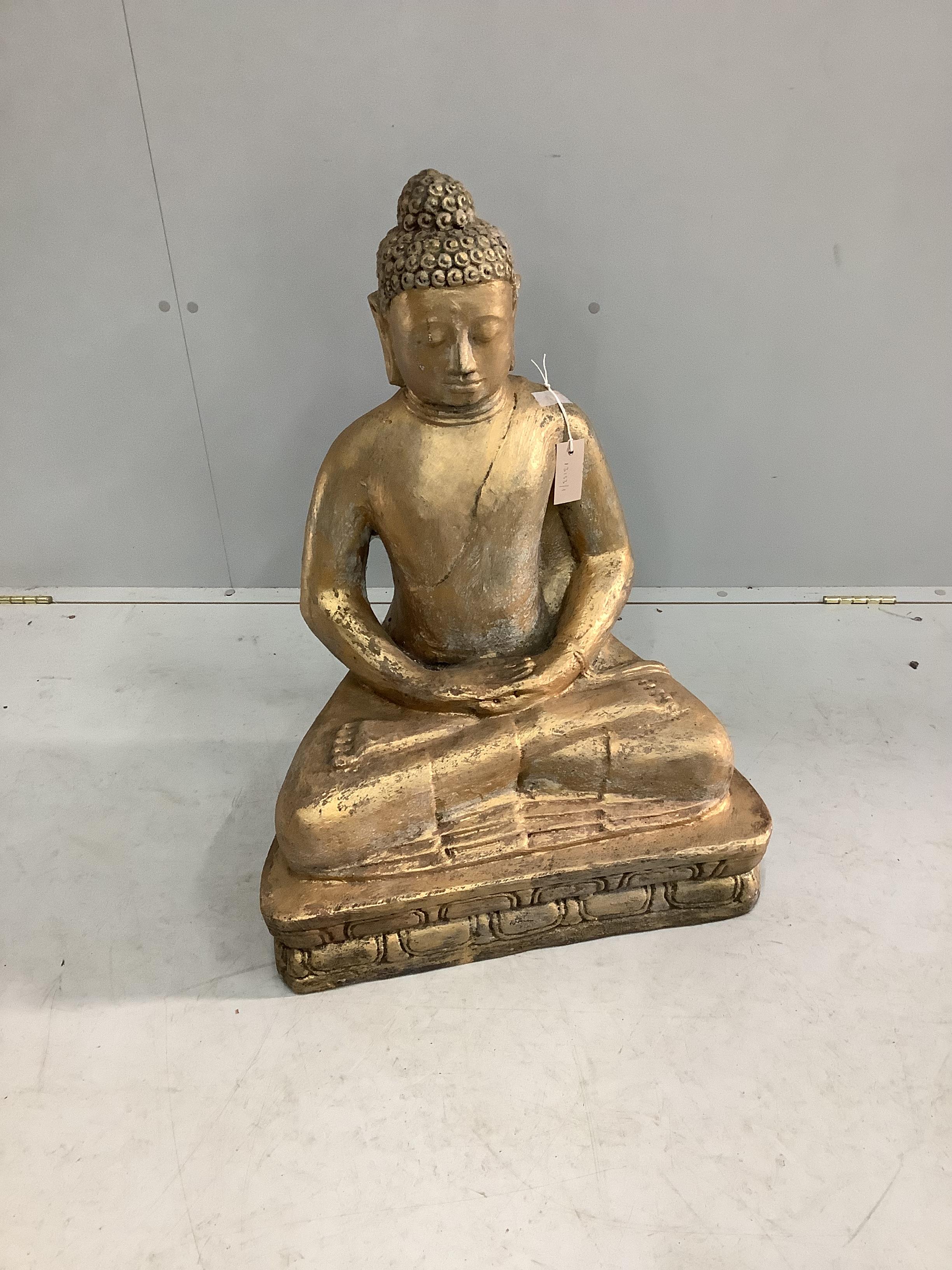A gilt composition Buddha, height 75cm                                                                                                                                                                                      