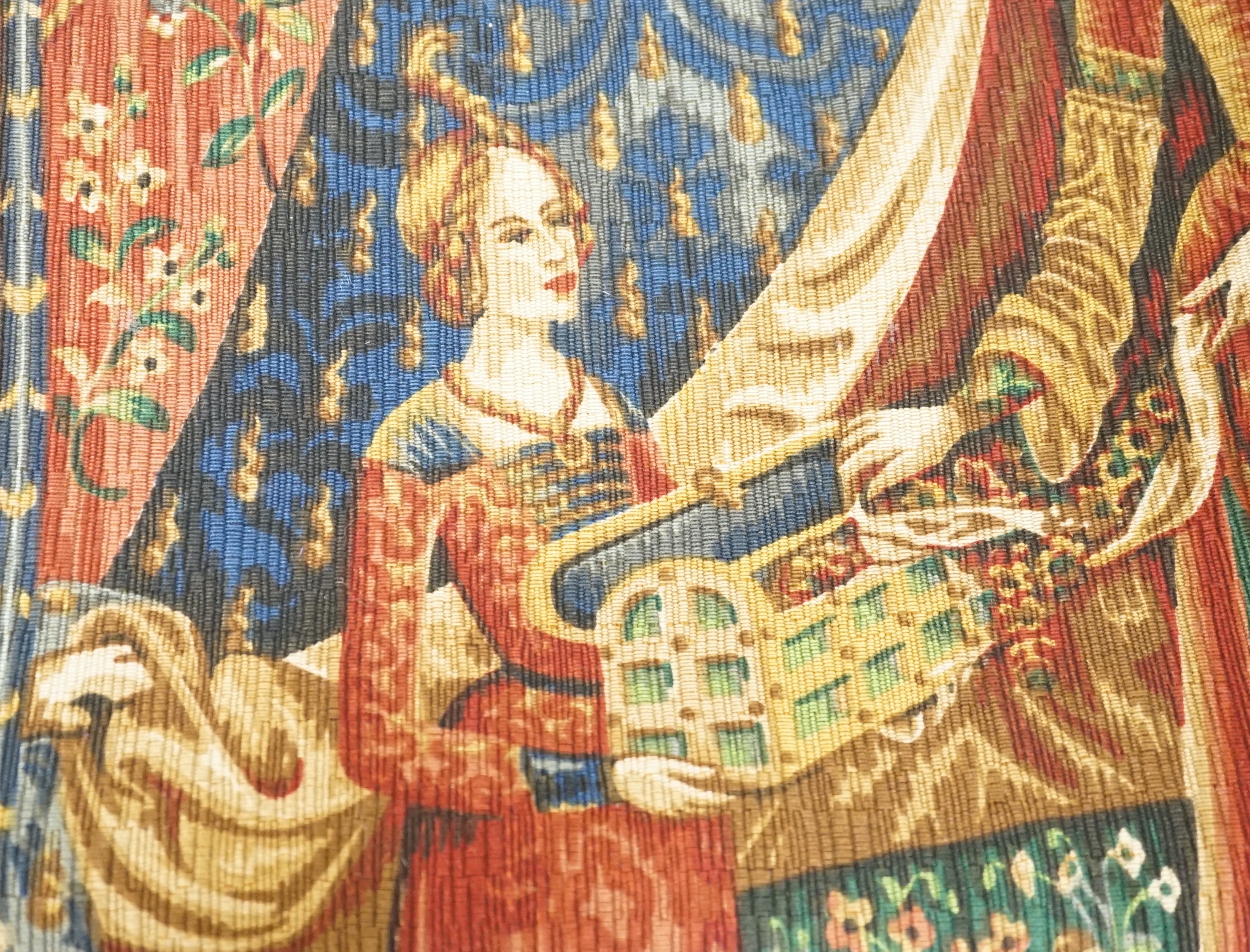 A printed panel depicting a medieval scene                                                                                                                                                                                  