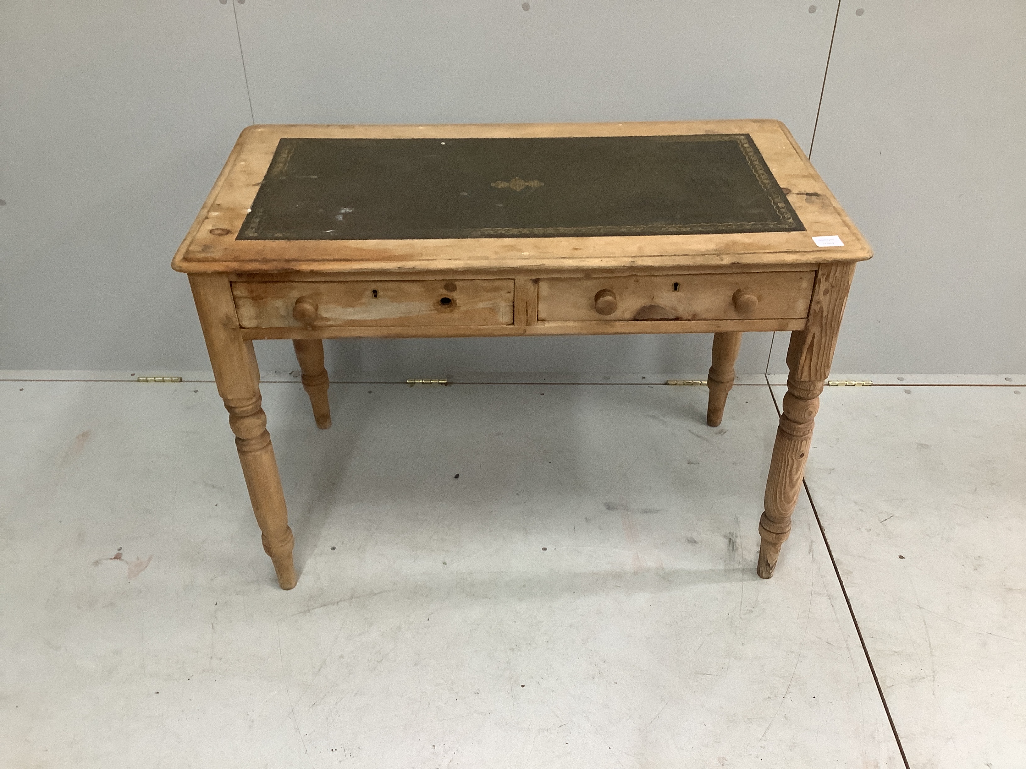 A Victorian pine two drawer side table, width 105cm, depth 56cm, height 73cm                                                                                                                                                