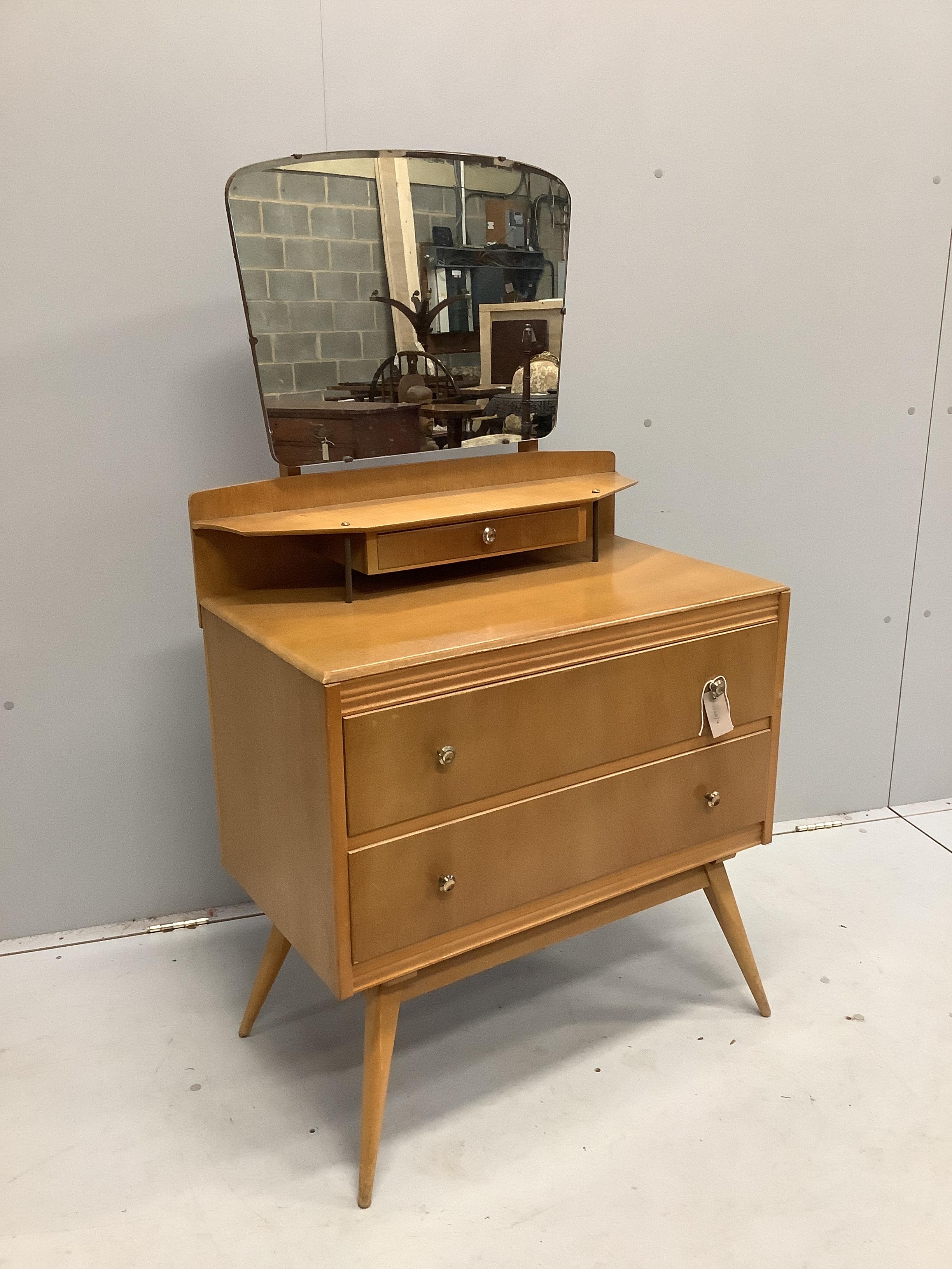 A mid century two drawer dressing table, width 76cm, depth 42cm, height 130cm                                                                                                                                               