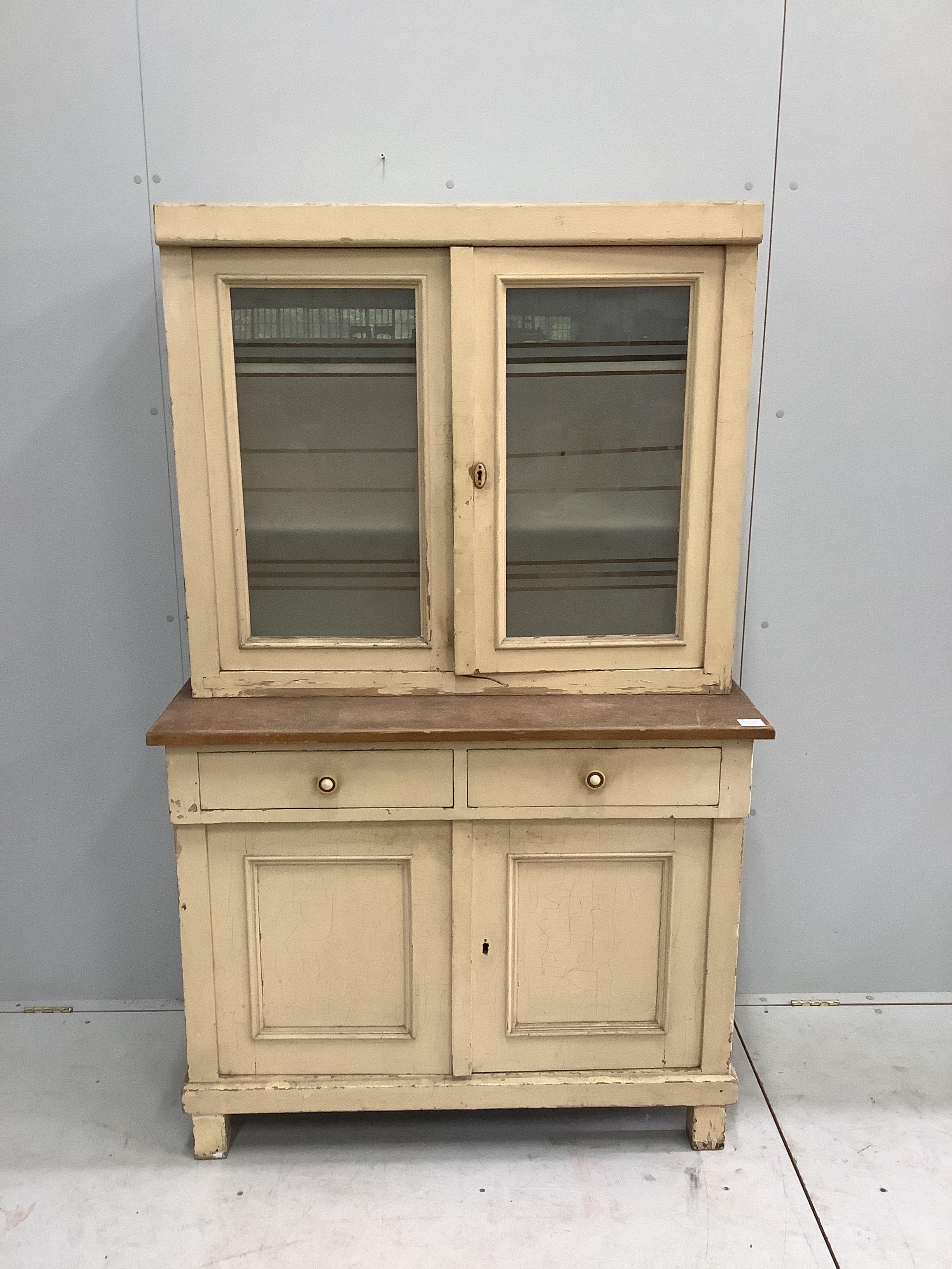 A late 19th century Continental painted pine kitchen cabinet, width 104cm, depth 56cm, height 169cm                                                                                                                         