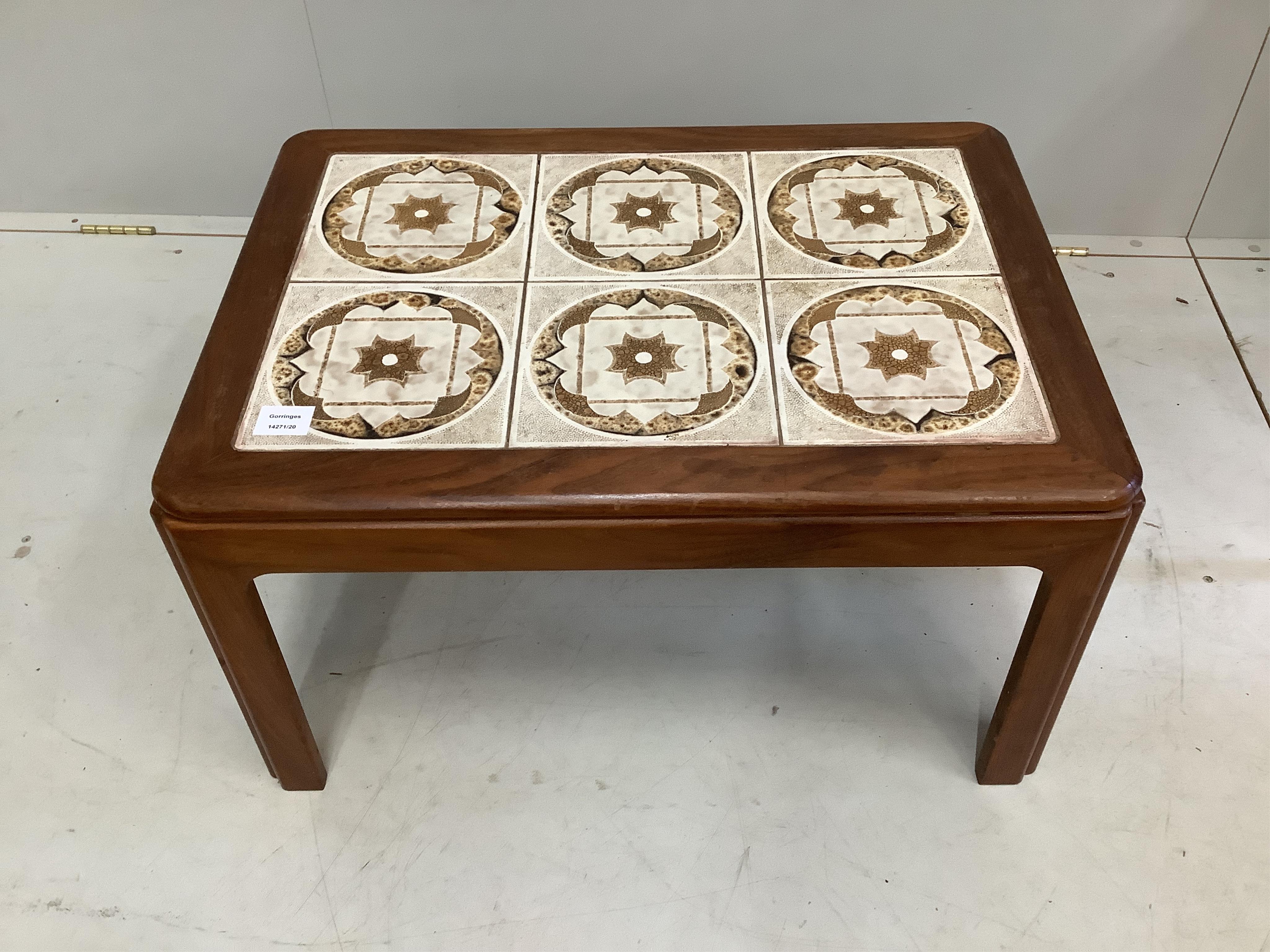 A mid century teak tiled top coffee table, width 70cm, depth 50cm, height 40cm                                                                                                                                              