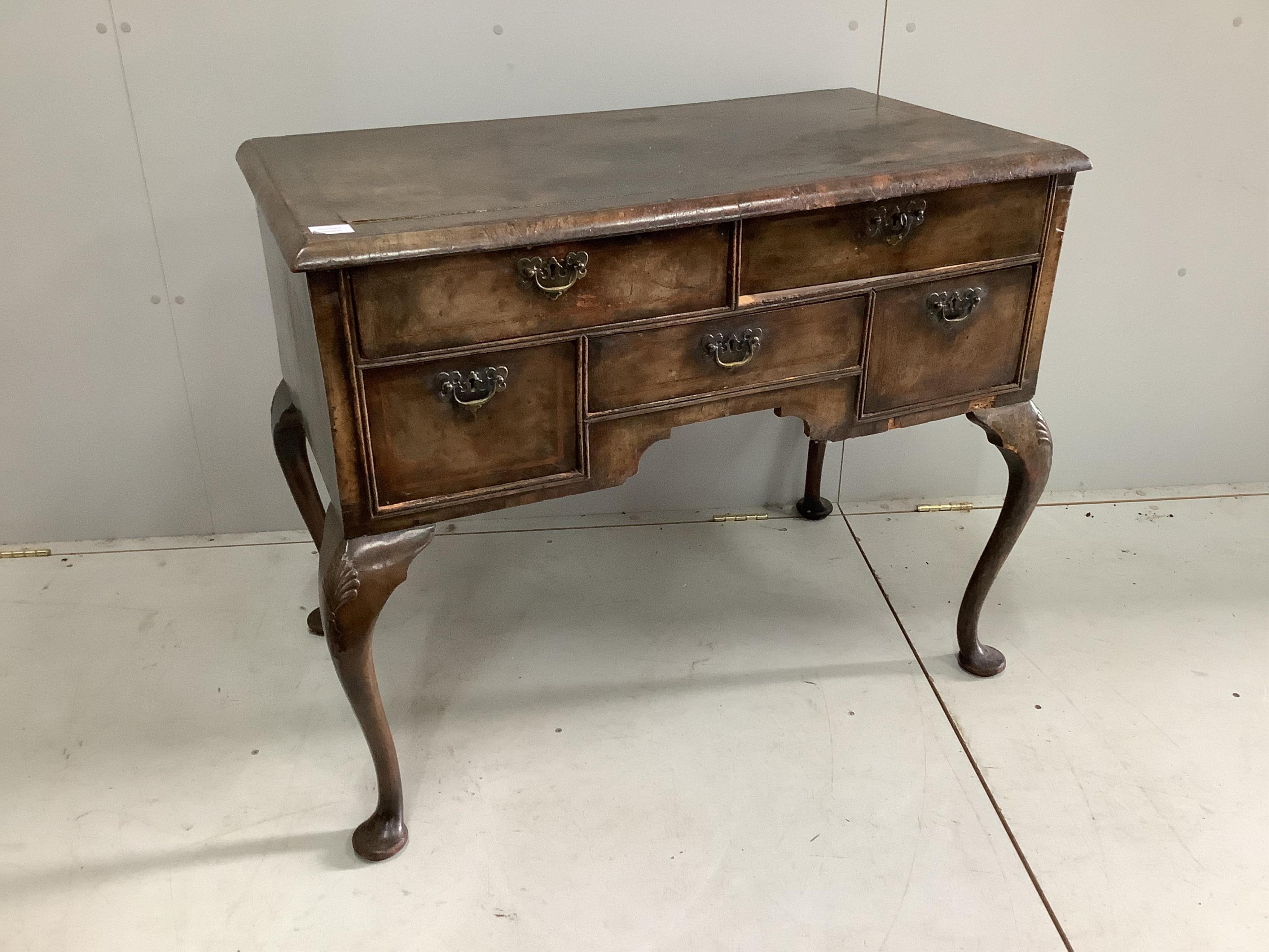 An early 18th century and later walnut side table, width 102cm, height 81cm. Condition - poor                                                                                                                               