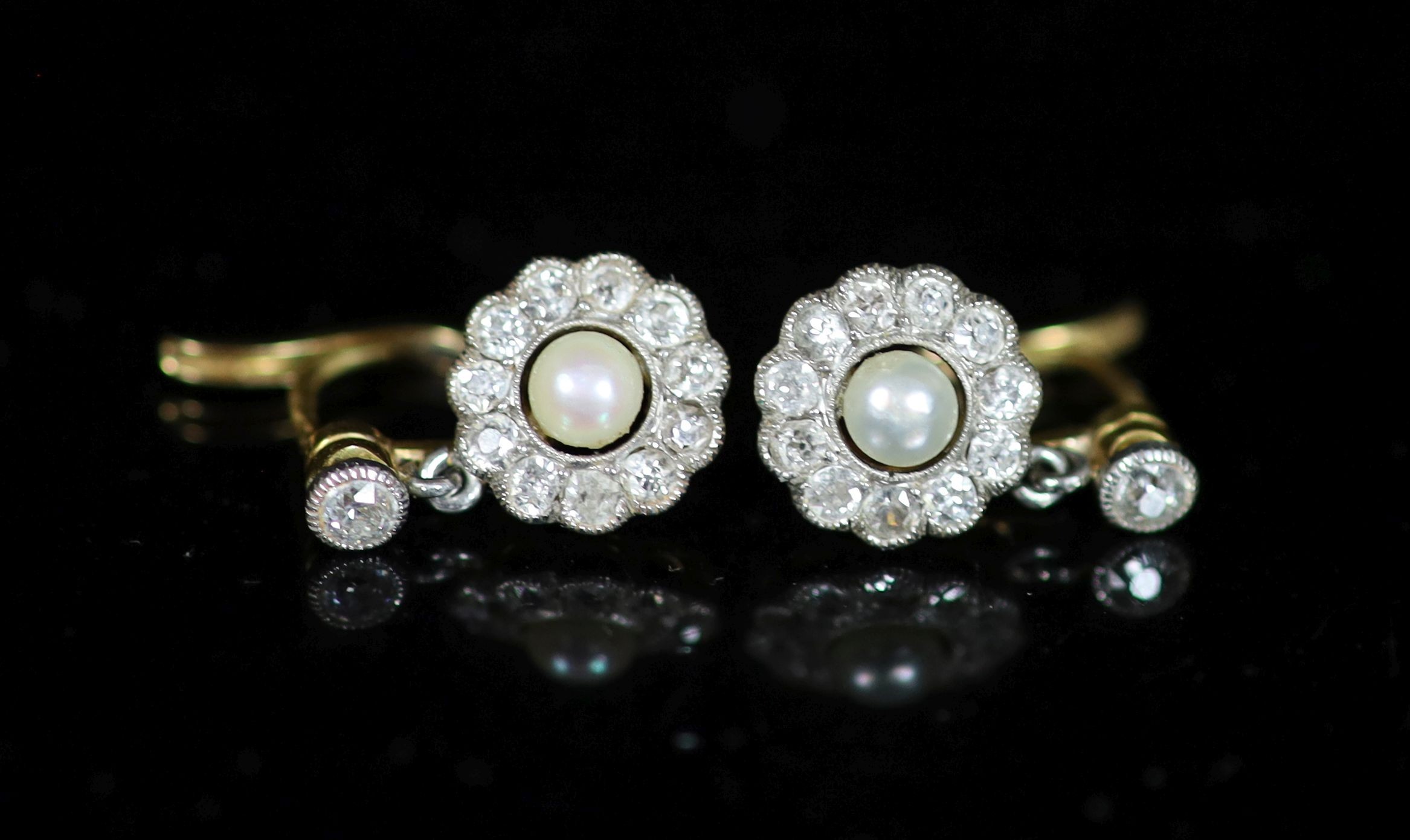 A pair of antique gold, pearl and diamond set circular cluster drop earrings                                                                                                                                                