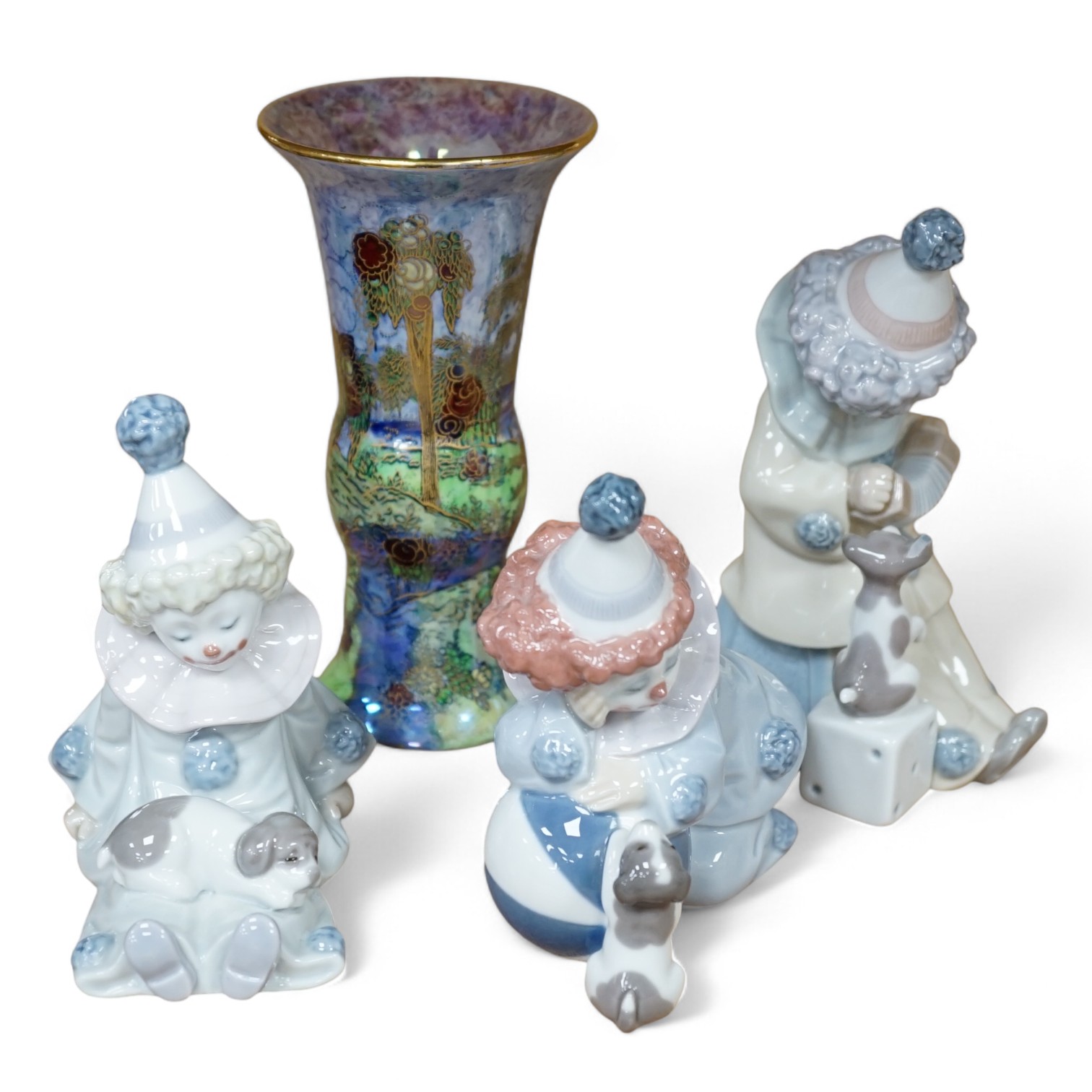 Three Lladro clowns and a Carlton ware dragon and cloud pattern vase, stamped to the base, largest 16cm high. Condition - fair, a few small chips                                                                           