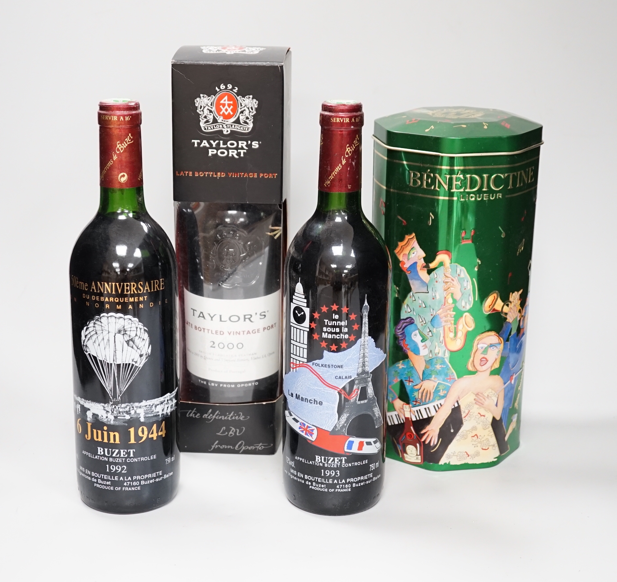 A bottle of Buzet 1992 commemorating the 50th anniversary of Normandy, a bottle of Buzet 1993 commemorating the Euro tunnel, a bottle of Taylor’s Port 2000 and a bottle of Benedictine.                                    