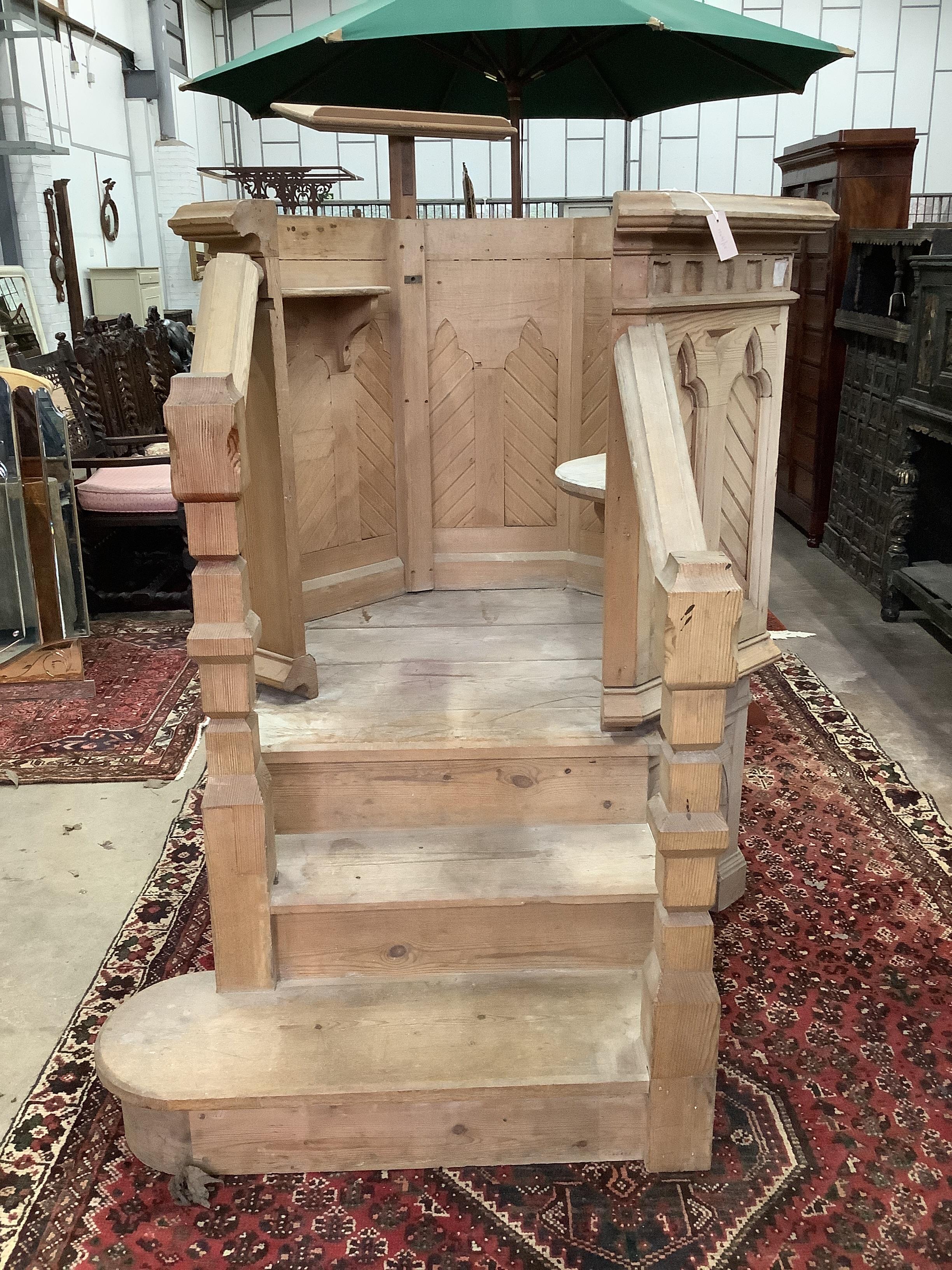 A Pugin style pitch pine pulpit with lecturn, height 165cm                                                                                                                                                                  
