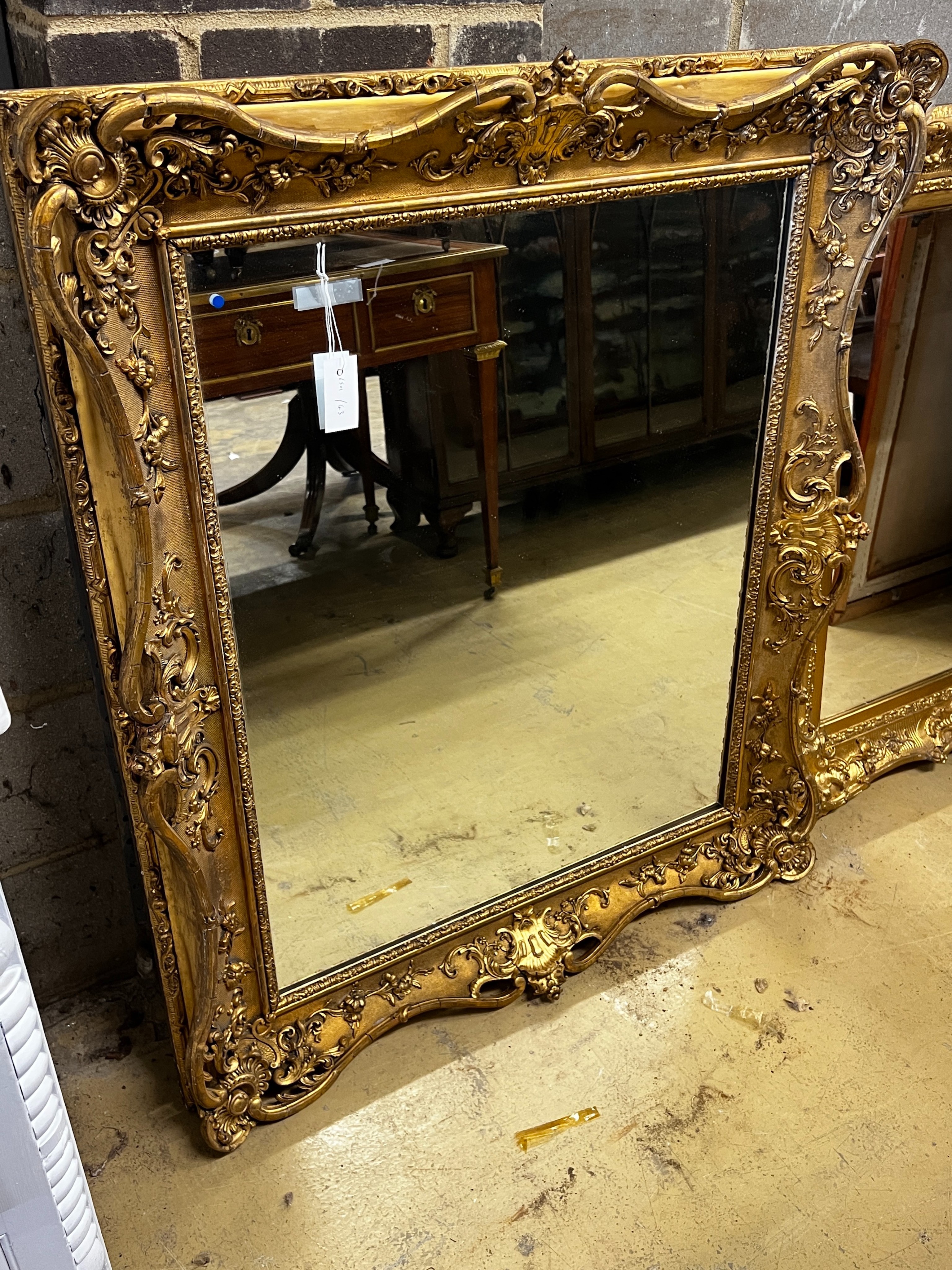 A Victorian giltwood and composition rectangular wall mirror converted from a picture frame, width 94cm, height 112cm                                                                                                       