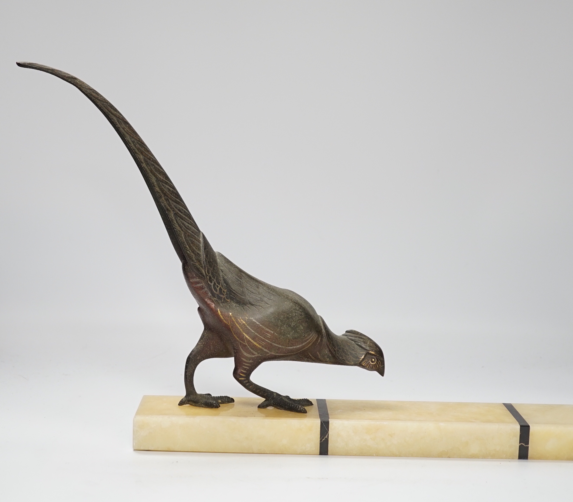 An Art Deco style spelter pheasant on rectangular onyx base, 55cm wide                                                                                                                                                      