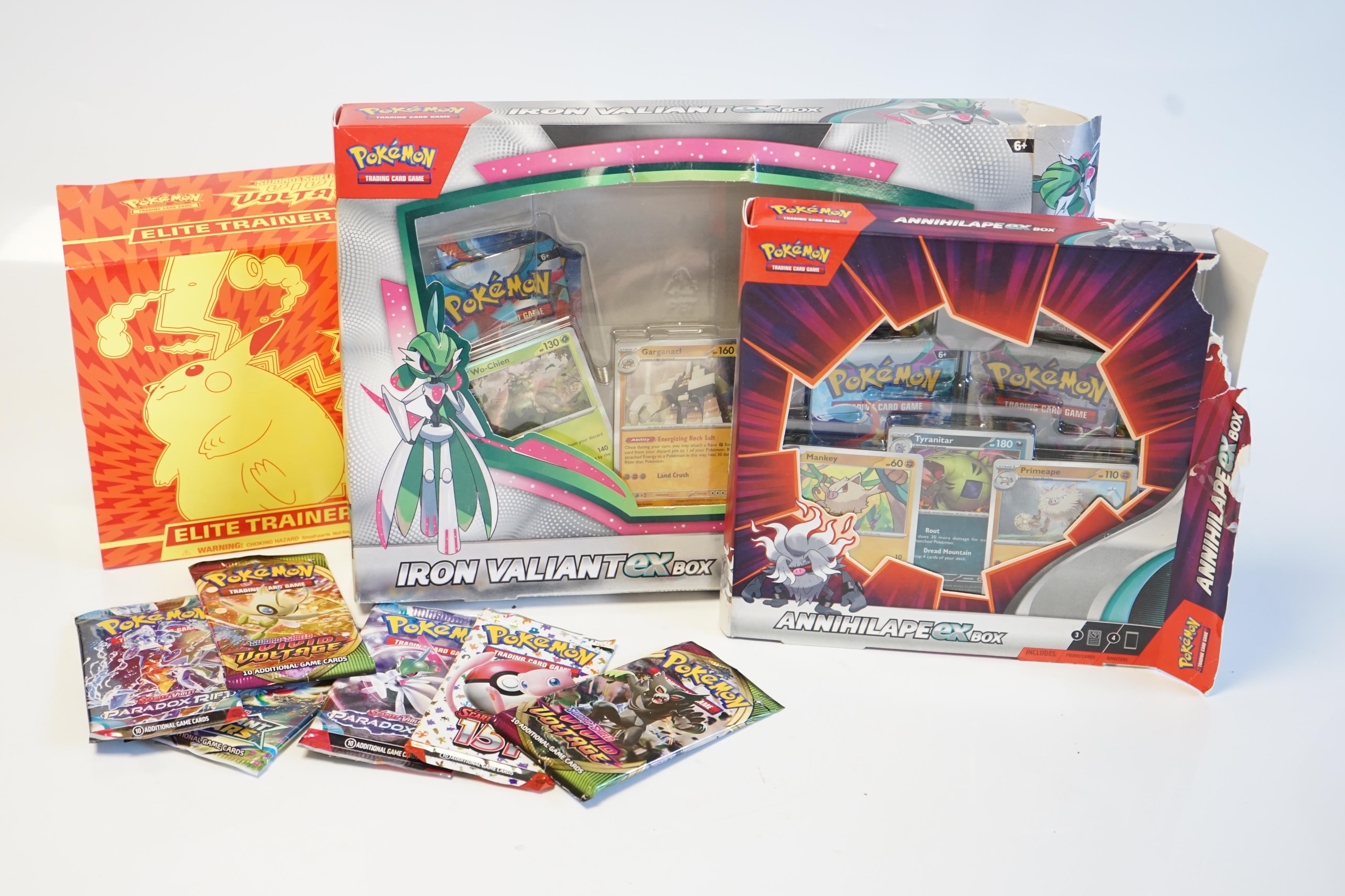 A collection of Pokemon cards and sets, including; approximately sixty 10-card expansion packs (opened), three Elite Trainer Boxes a Pokemon monopoly game, an Annihilape ex box, an Iron Valiant ex box, etc. (opened). Con