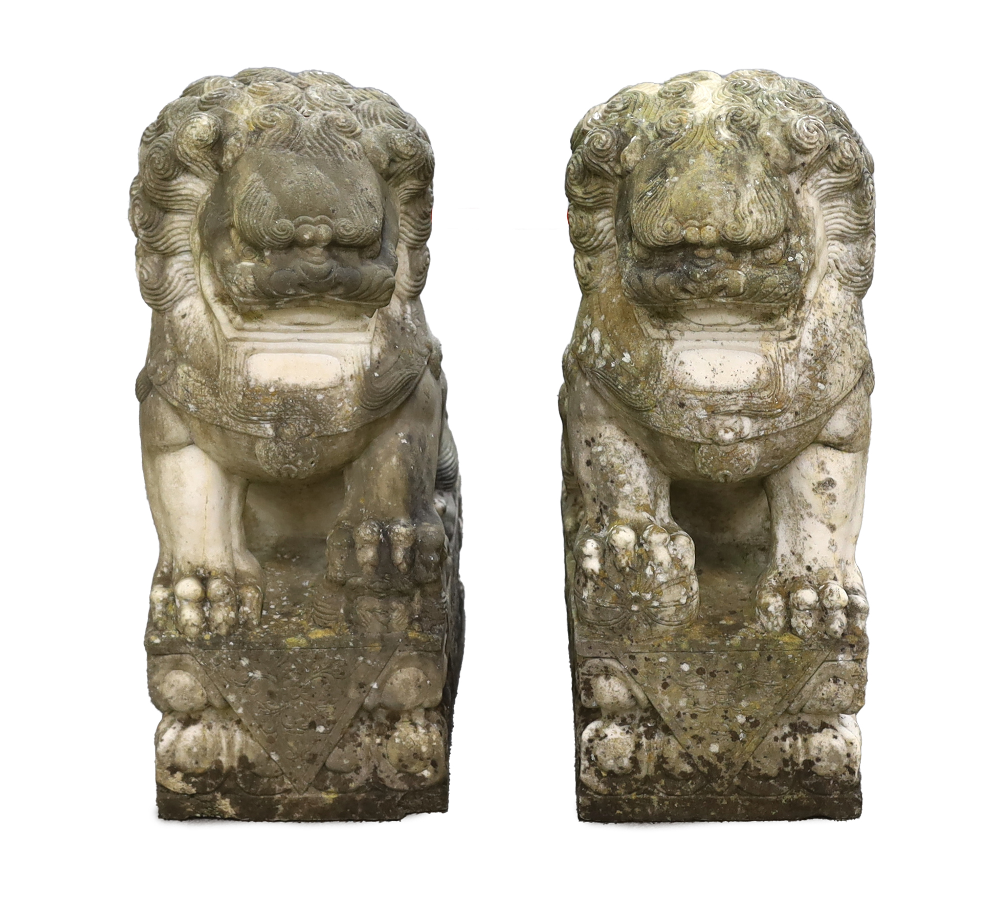 A pair of 20th century Chinese carved marble garden statues modelled as Dogs of Fo, 22cm wide, 31cm deep, 54cm high                                                                                                         