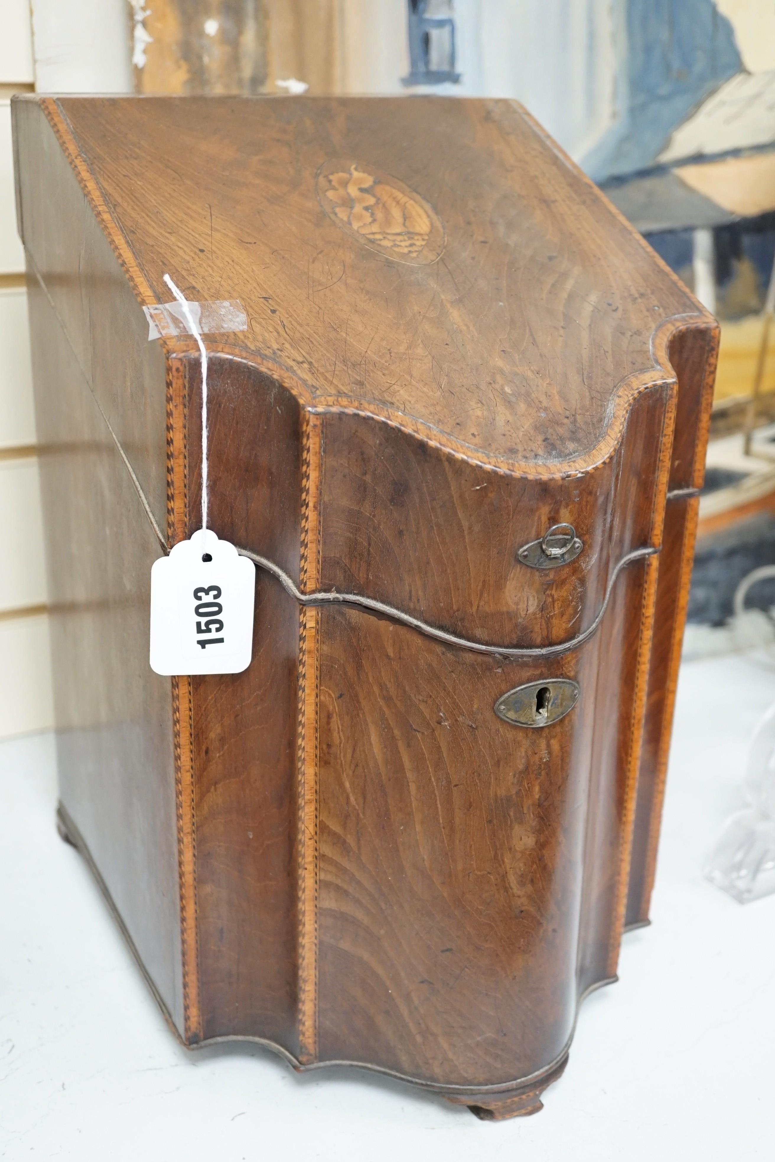 A George III shell inlaid mahogany knife box, 38cms high                                                                                                                                                                    