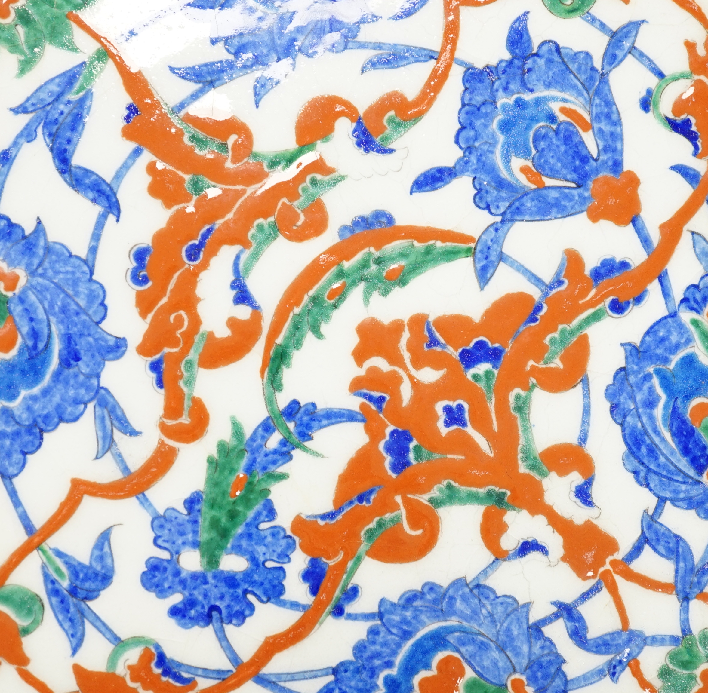 A Turkish Iznik tile, 25cm sq                                                                                                                                                                                               