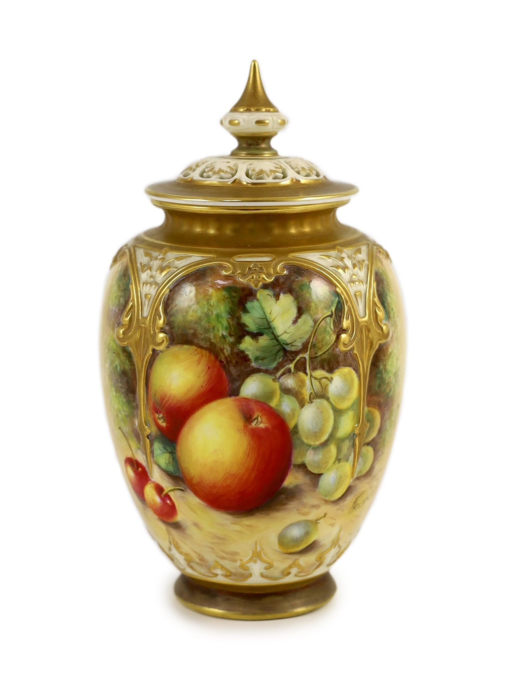 A Royal Worcester fruit painted vase and cover, by John Freeman, c.1962, 19cm high                                                                                                                                          