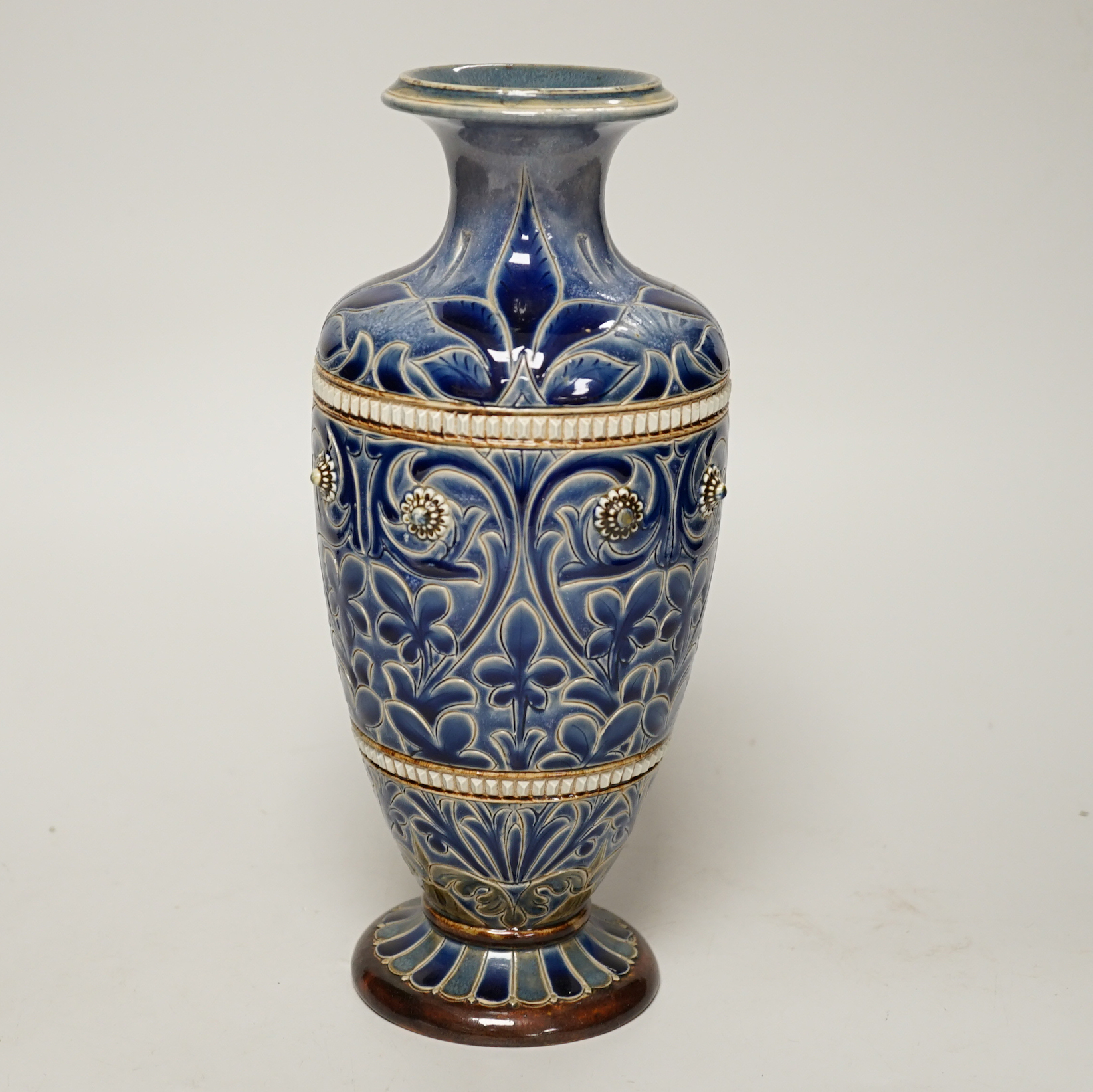 A Doulton Lambeth stoneware vase, by Emily E Stomer, dated 1882, 25cm                                                                                                                                                       