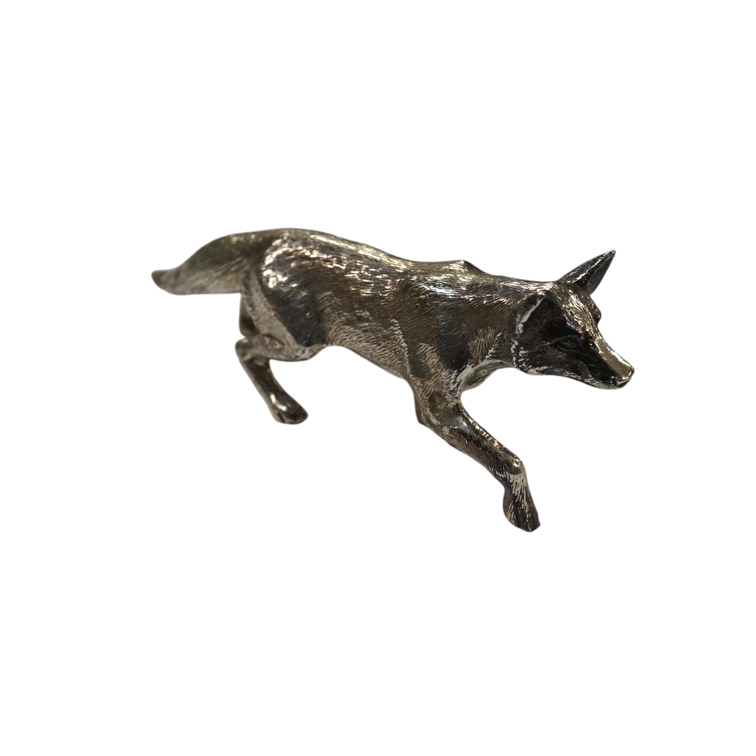 An Elizabeth II silver free standing model of a fox, C.J. Vander Ltd, Birmingham, 1965, length 15.8cm, 7oz. Condition - good                                                                                                