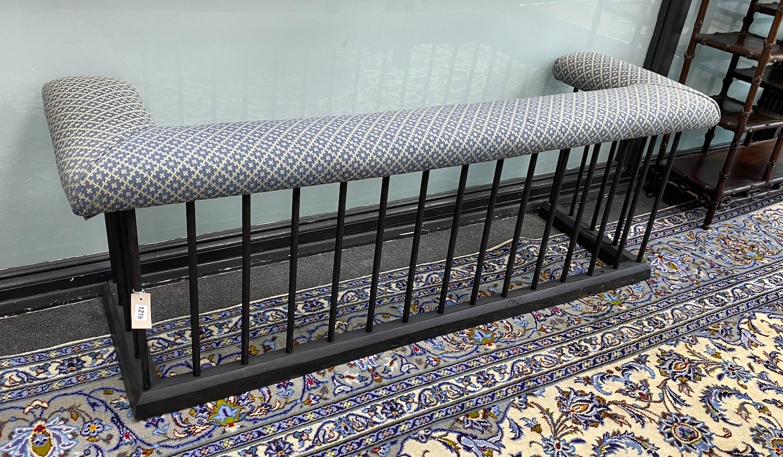 An early 20th century cast iron club fender, (re-painted and re-upholstered) length 164cm, depth 52cm, height 58cm                                                                                                          