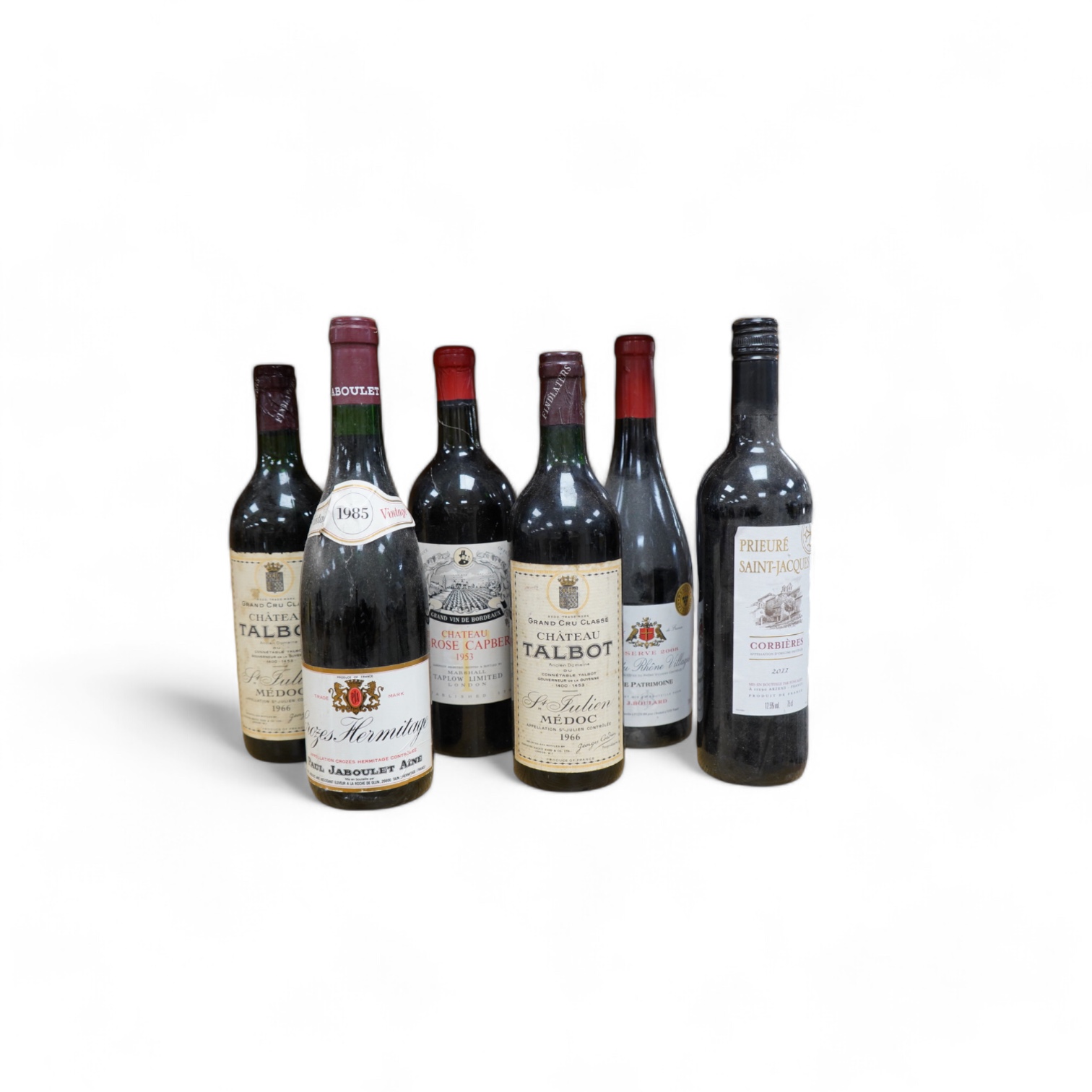 Six bottles of wine comprising two bottles of Chateau Talbot St Julien Medoc grand Cru 1966, one bottle of Chateau La Rose Capbern, Bordeaux 1953, one bottle of Crozes Hermitage vintage 1985, one bottle of Prieure Saint-
