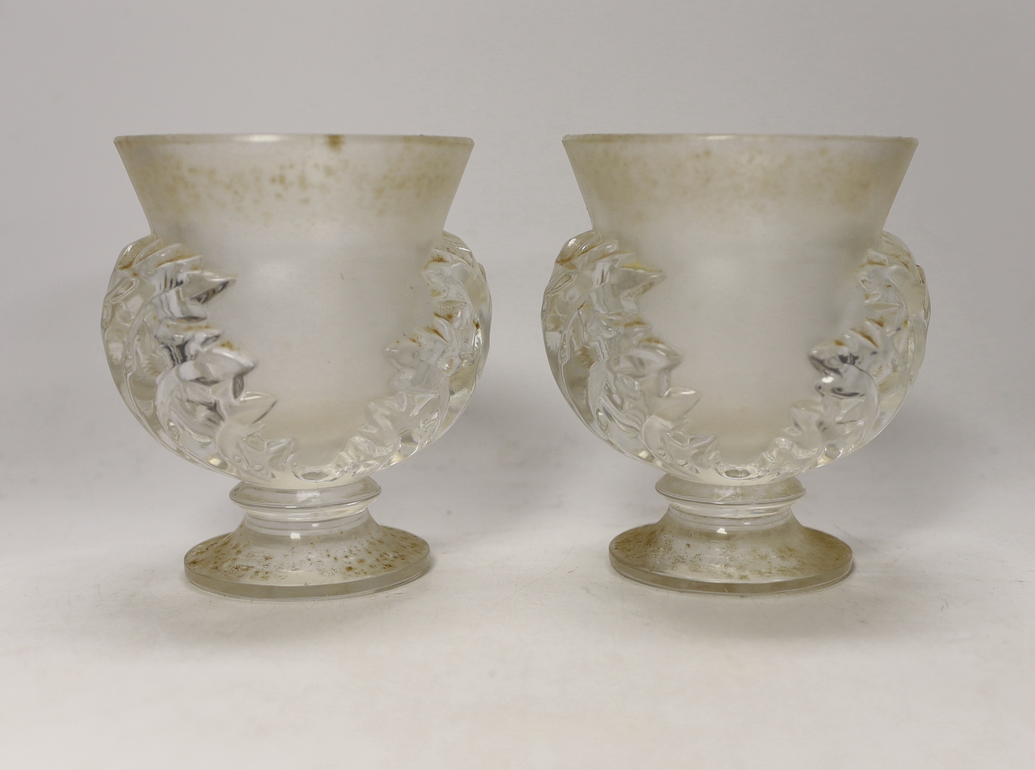 A pair of Lalique glass vases decorated in the St Cloud Acanthaceae pattern, etched mark, 12cm                                                                                                                              