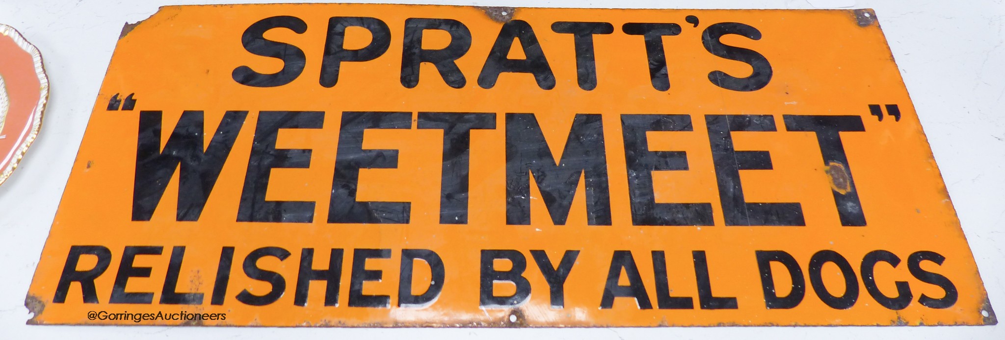 A Spratt's Weetmeet enamel sign, 75cm wide, 30.5cm high                                                                                                                                                                     