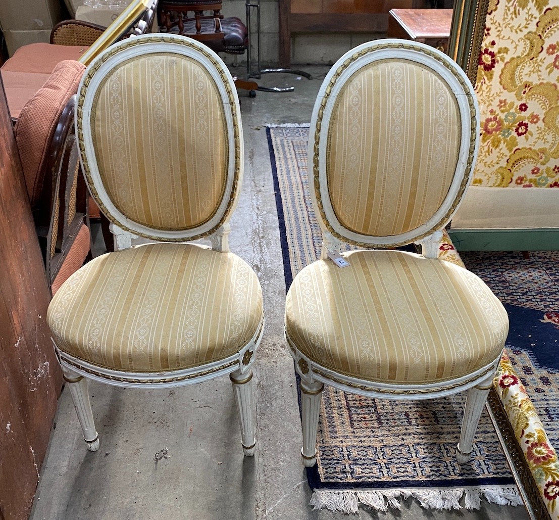 A pair of French painted side chairs, width 54cm, depth 50cm, height 99cm                                                                                                                                                   