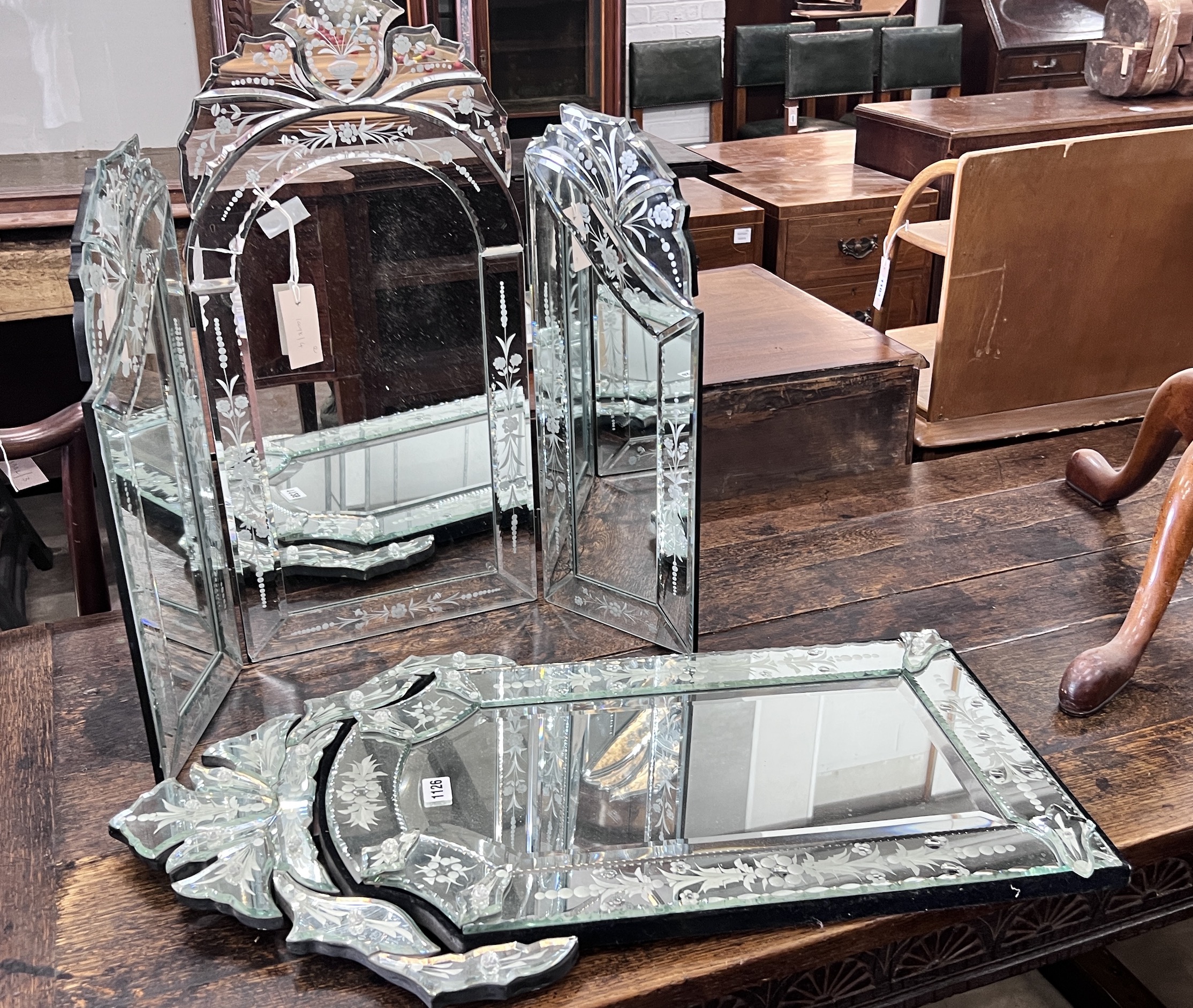 A Venetian style triple dressing table mirror, height 63cm together with a circular wall mirror, height 76cm                                                                                                                
