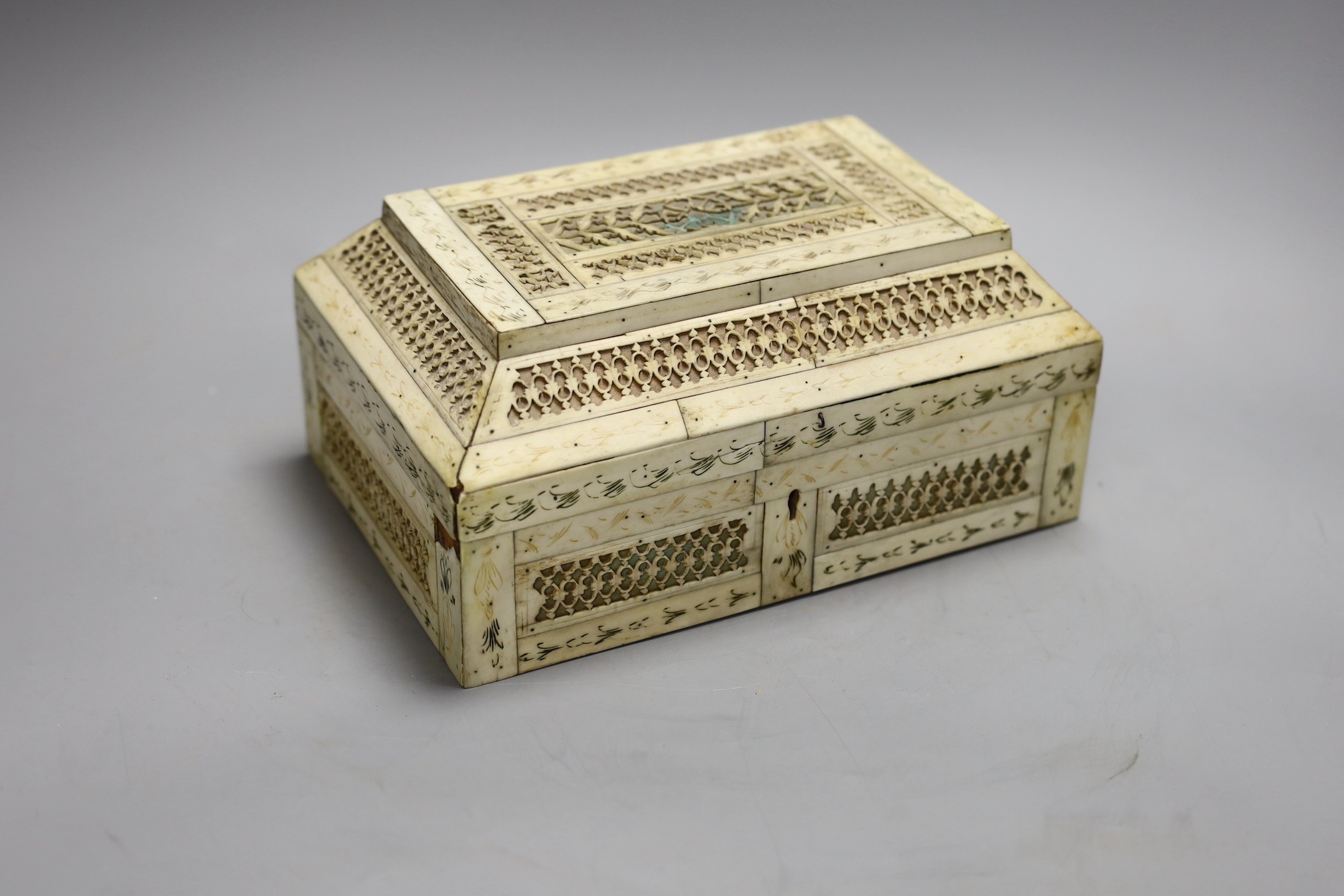 A 19th century prisoner of war fretted bone box, 21.5cm wide                                                                                                                                                                