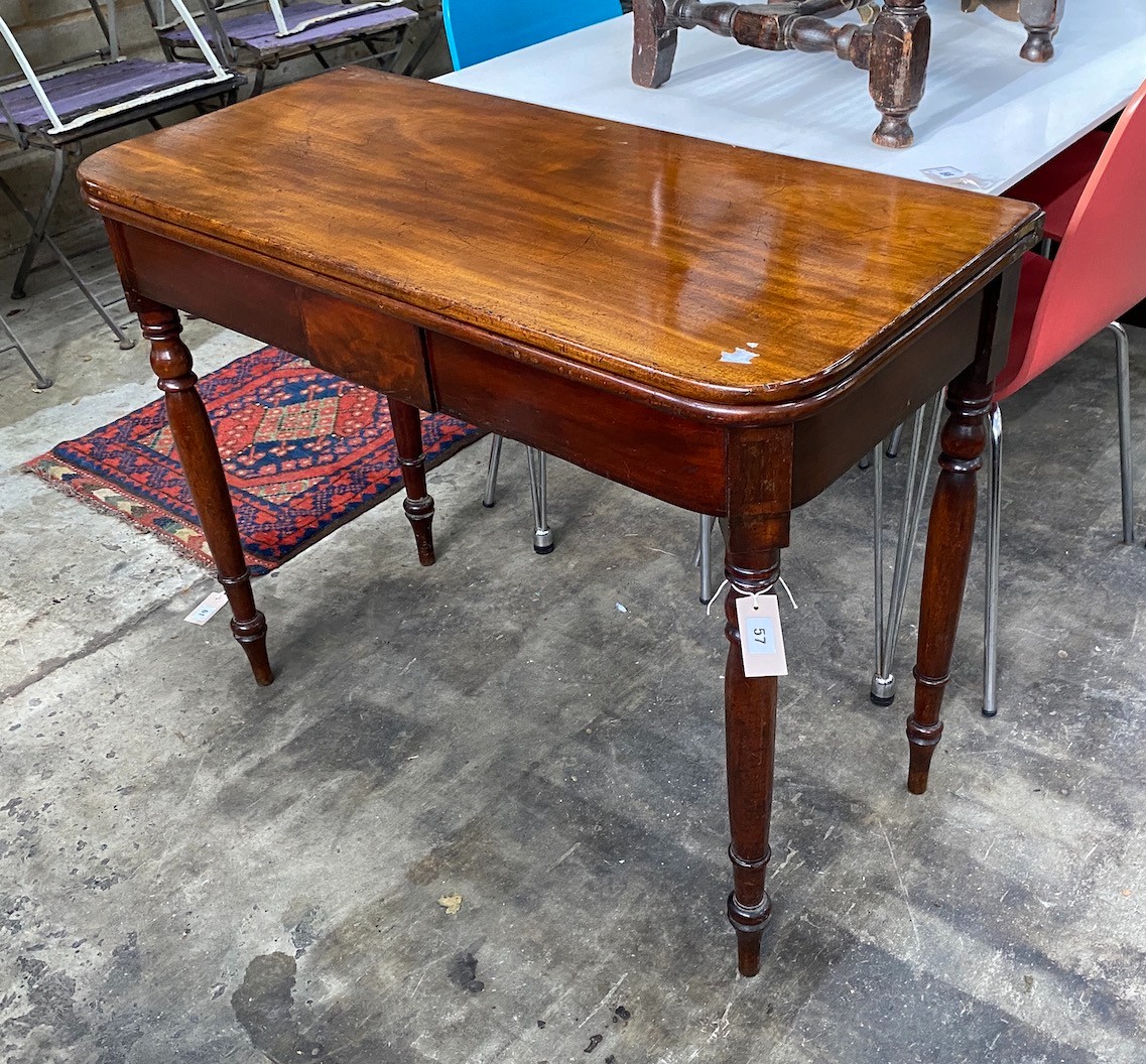 An early Victorian rectangular mahogany folding tea table, width 93cm, depth 44cm, height 75cm                                                                                                                              