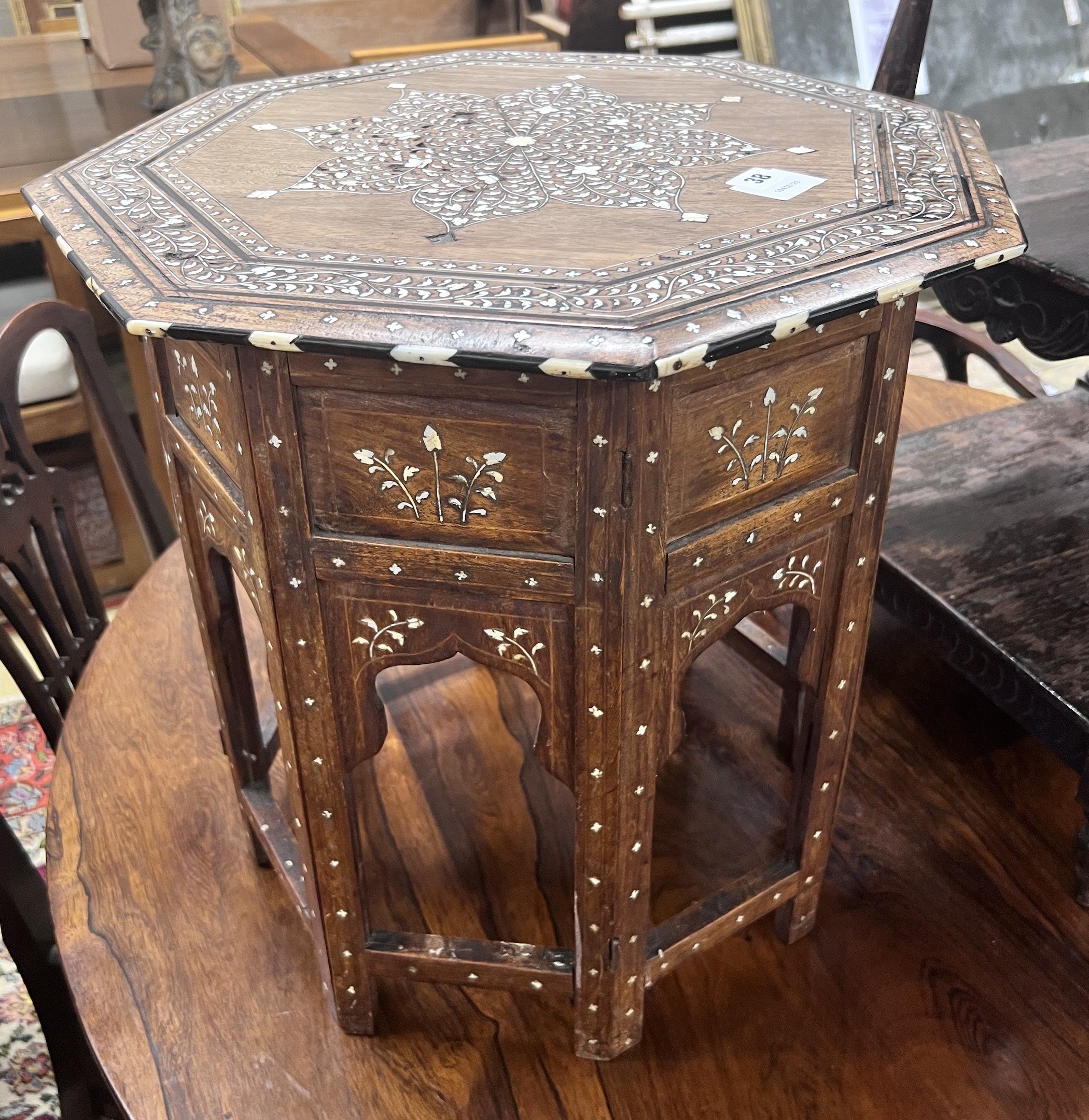An Indian octagonal bone inlaid hardwood occasional table, width 51cm, height 52cm                                                                                                                                          
