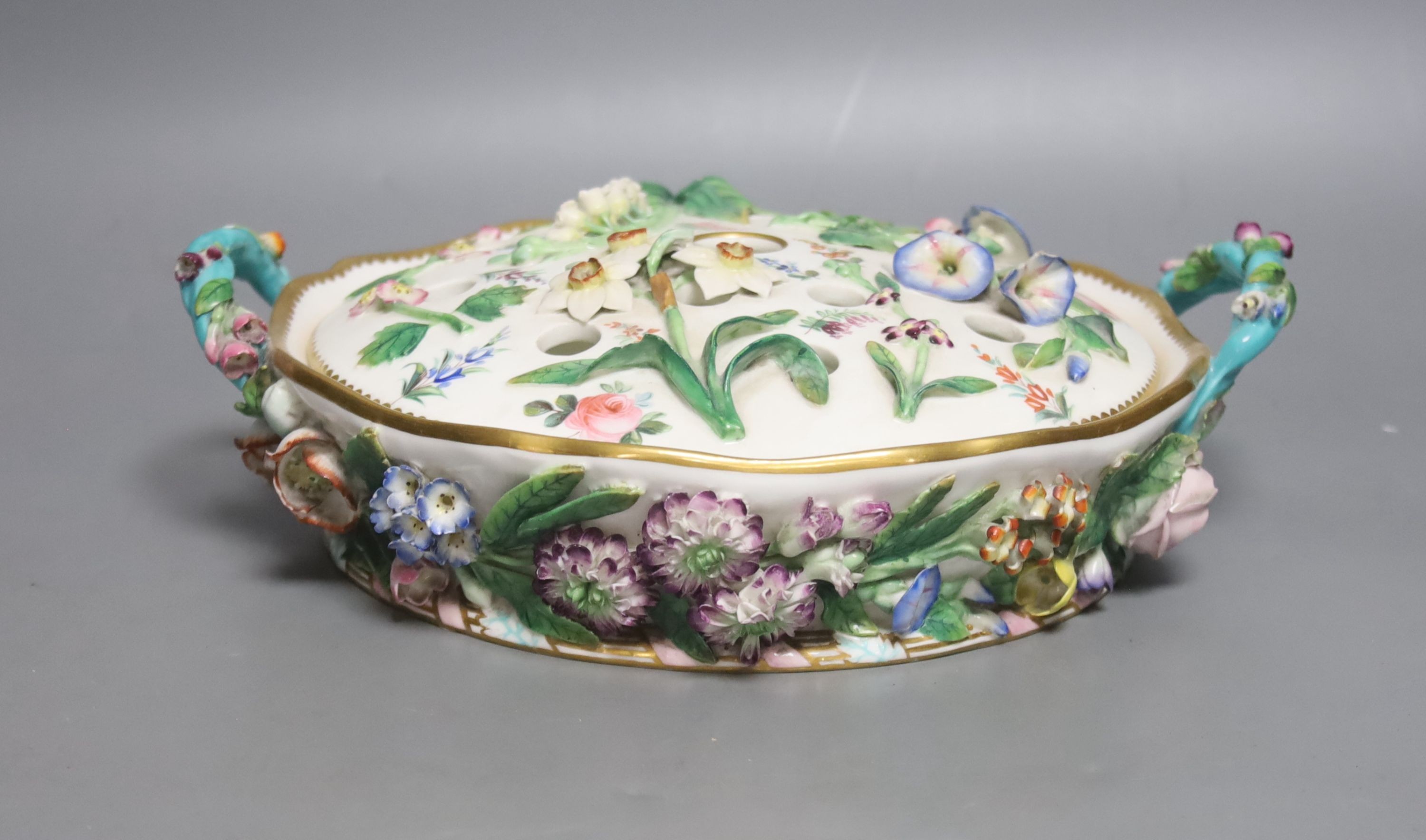 A Minton porcelain floral encrusted lidded pot pourri, mid 19th century, unmarked, 25cm wide                                                                                                                                