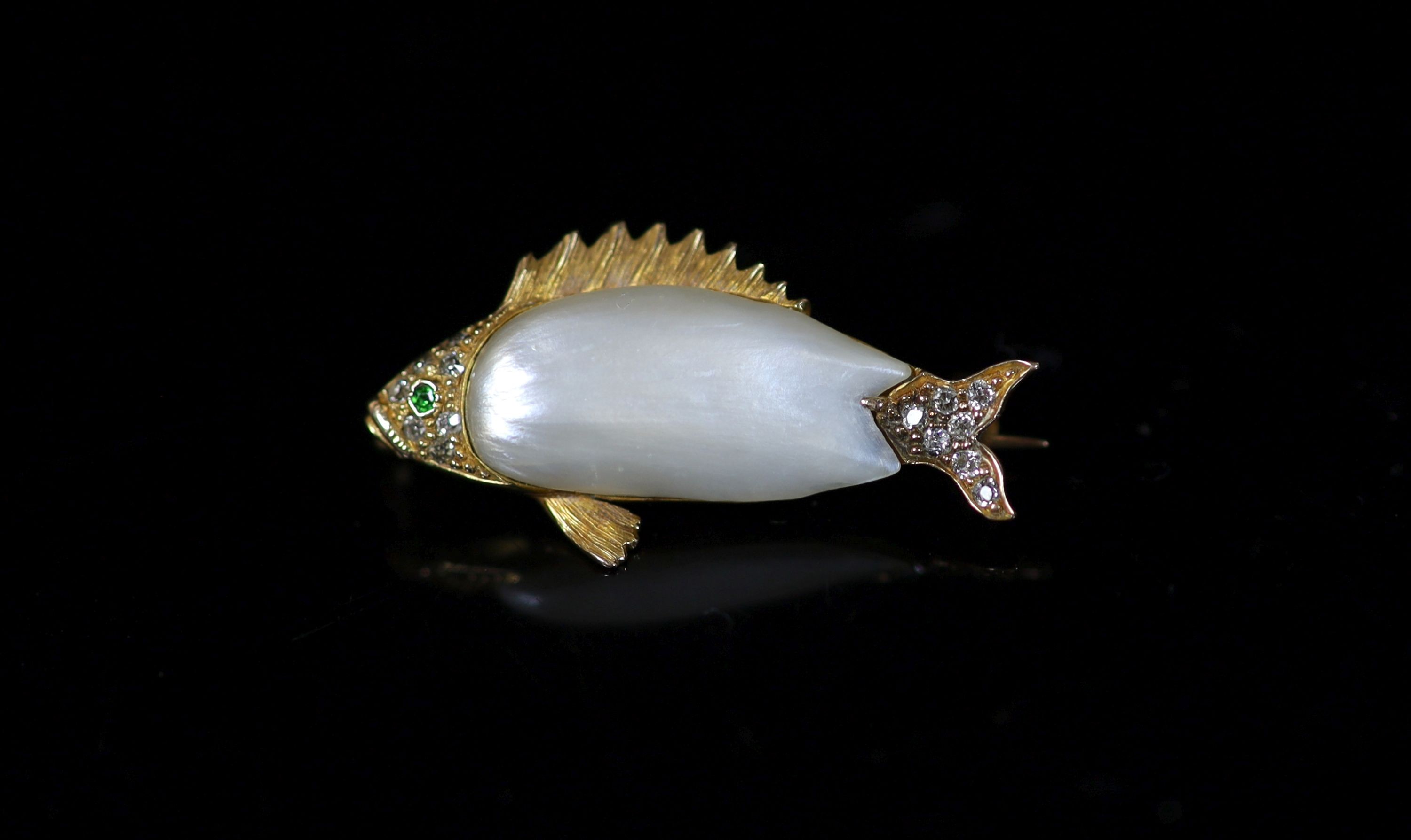 A gold, baroque pearl, garnet and diamond set brooch, modelled as a fish                                                                                                                                                    