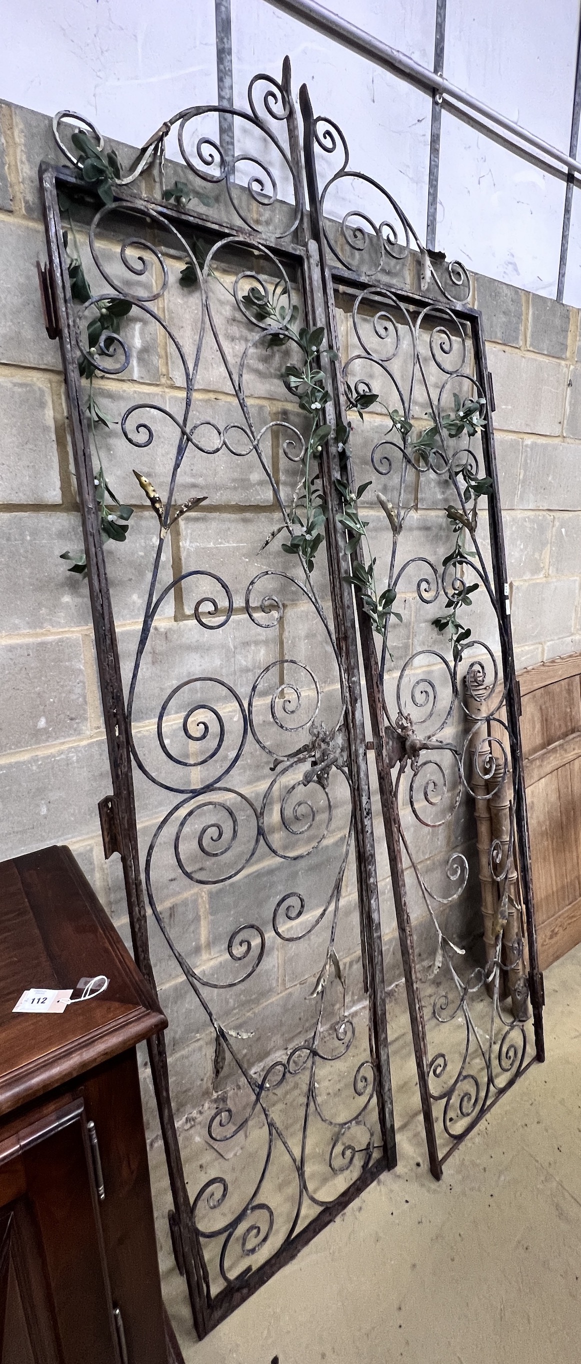 A pair of vintage French wrought iron gates, width 110cm, height 250cm                                                                                                                                                      