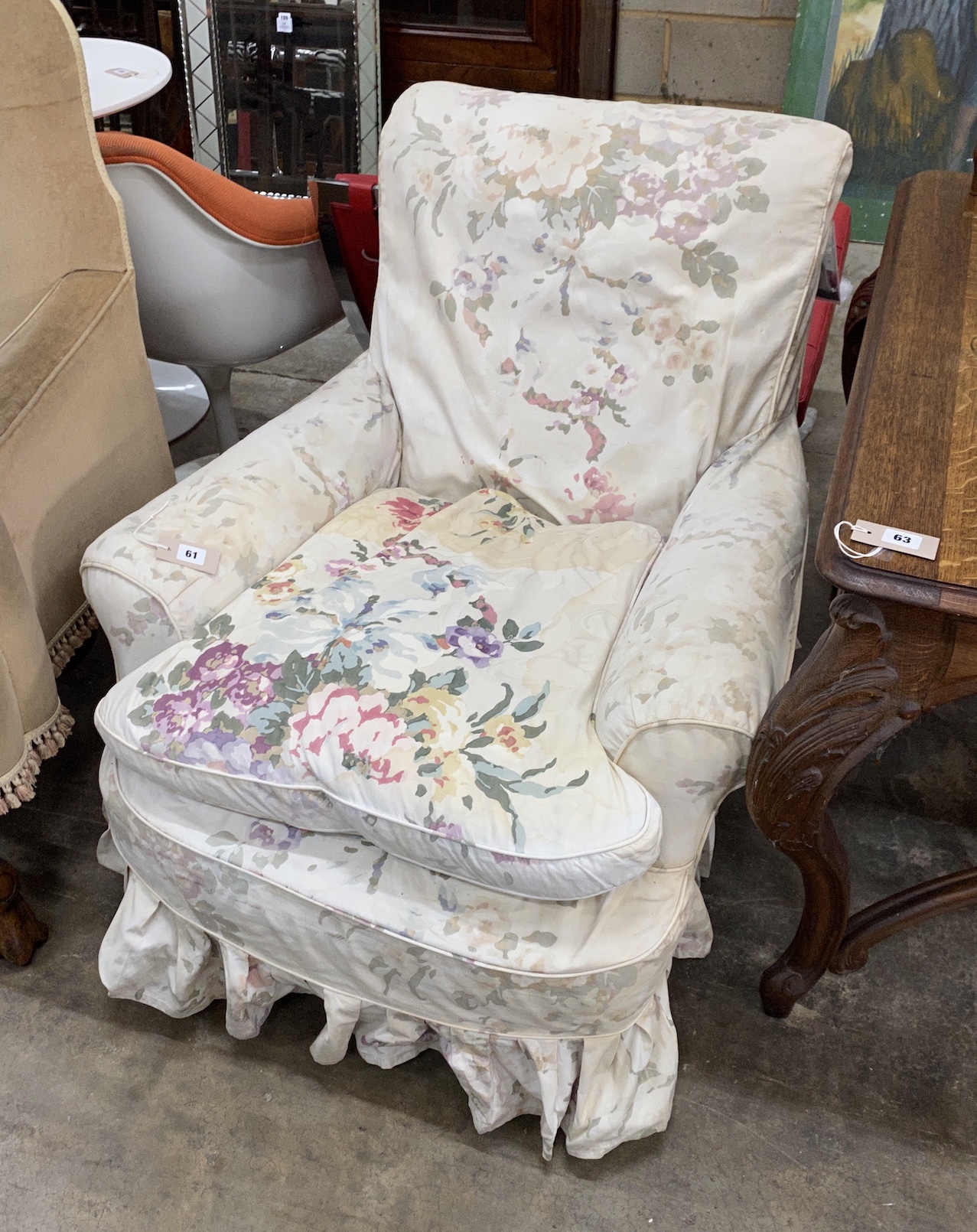 A late Victorian upholstered armchair, width 82cm, depth 80cm, height 88cm                                                                                                                                                  