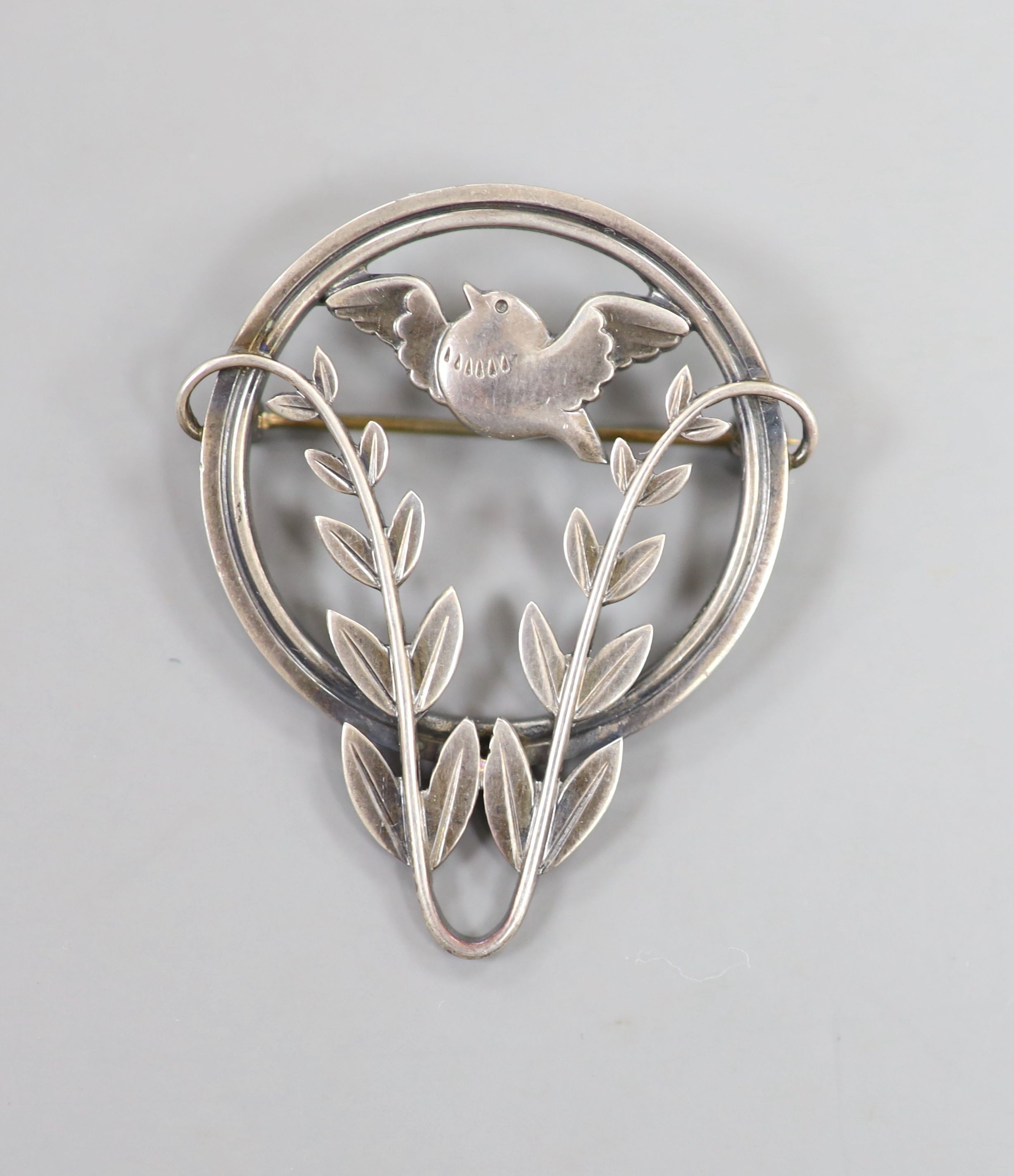 A Georg Jensen sterling robin and frond shaped circular brooch, no. 258, 43mm.                                                                                                                                              