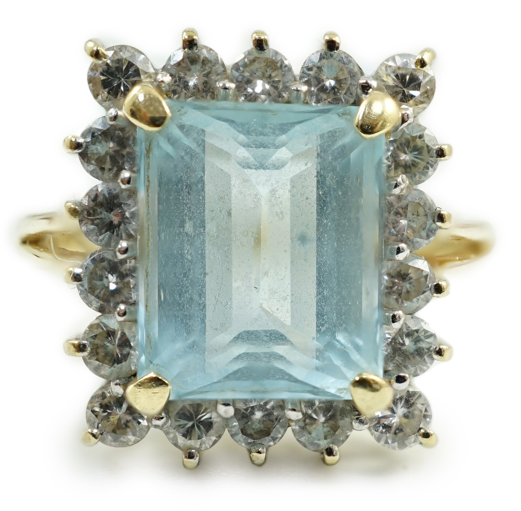 A 585 yellow metal, aquamarine and diamond set rectangular cluster ring, size N, gross weight 6.2 grams.                                                                                                                    