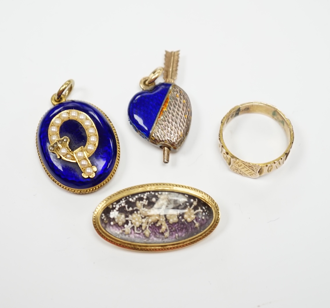 A Victorian yellow metal, blue enamel, seed pearl and rose cut diamond set oval pendant, with glazed back, 28mm, a late Victorian 9ct gold signet ring, engraved Mattie, a glazed yellow metal, enamel and seed pearl oval b