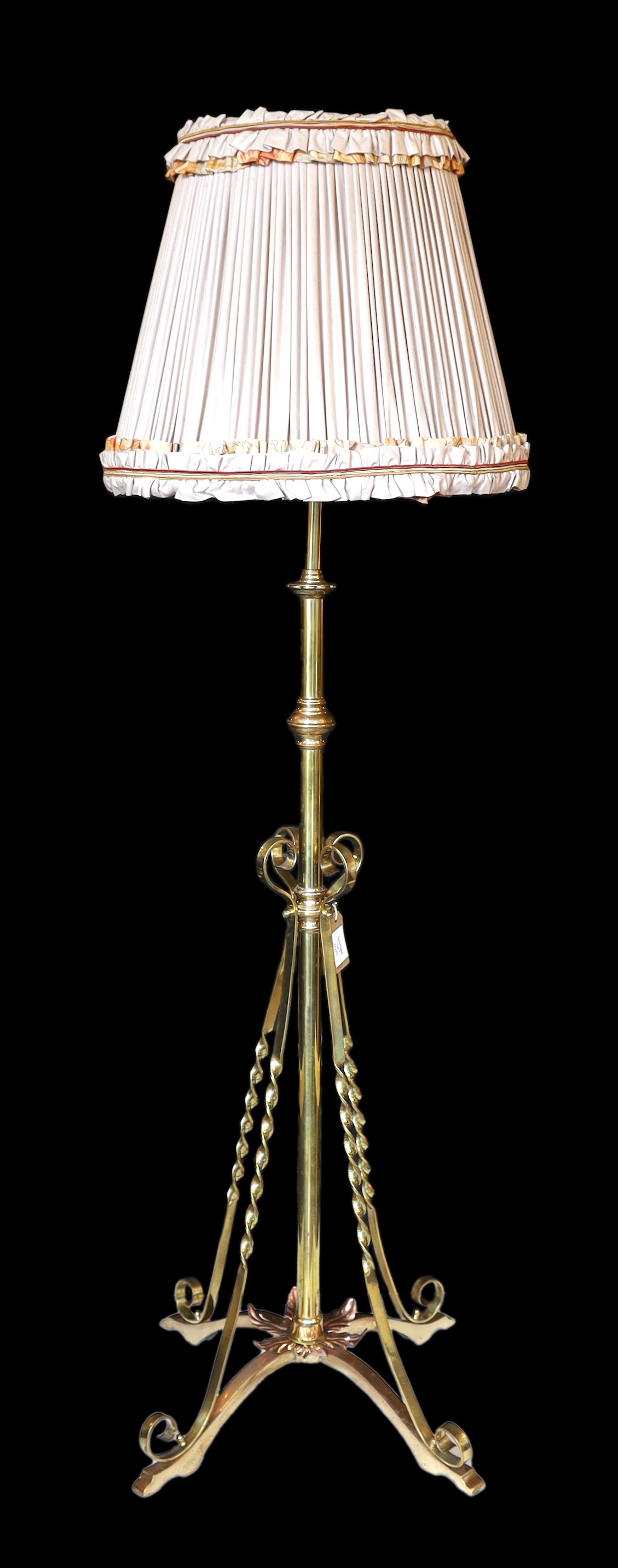 A late 19th century English brass and copper telescopic oil lamp standard converted to electricity, height 145cm. width of base 55cm.                                                                                       