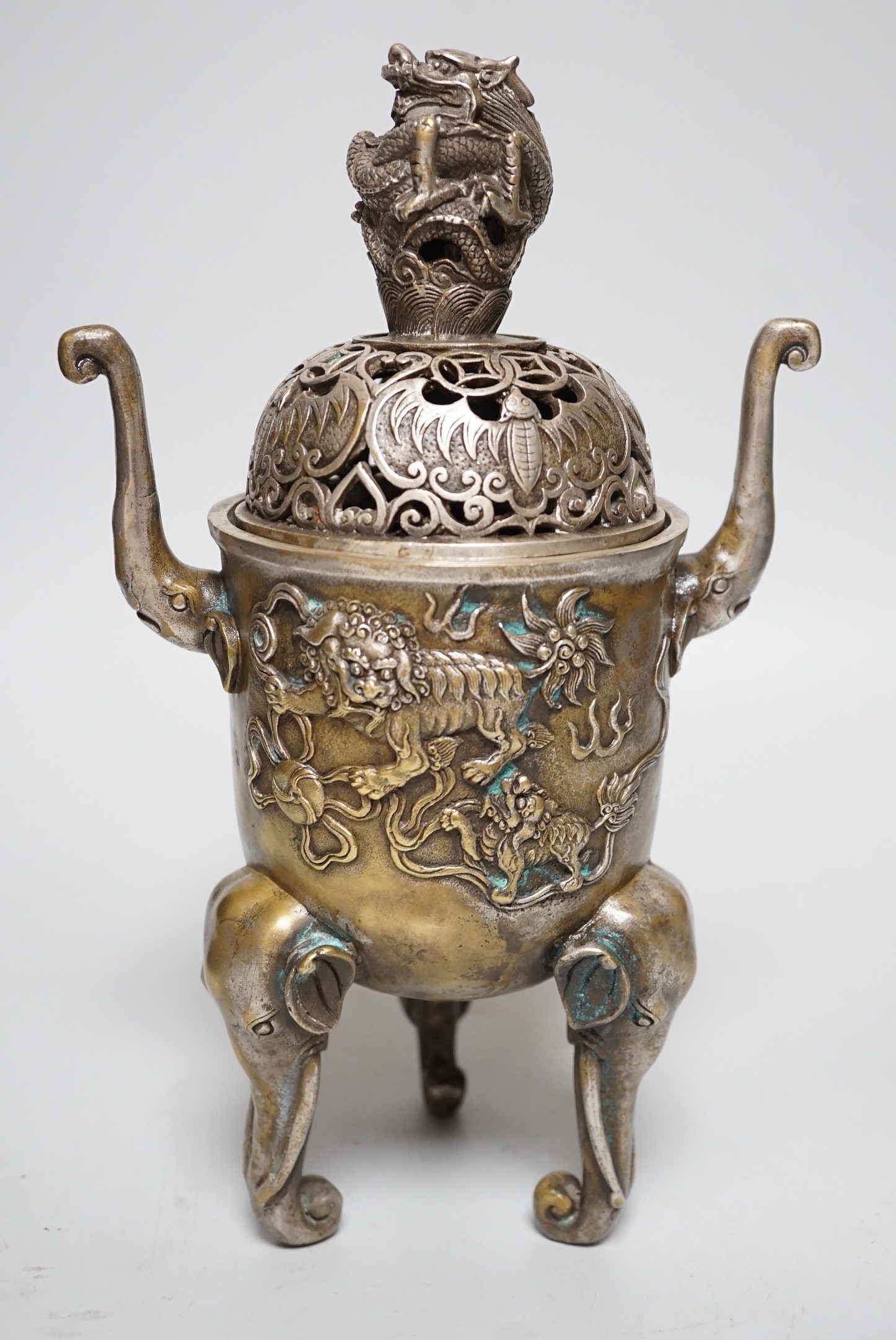 A Chinese silvered bronze censer and cover, 29cms high                                                                                                                                                                      