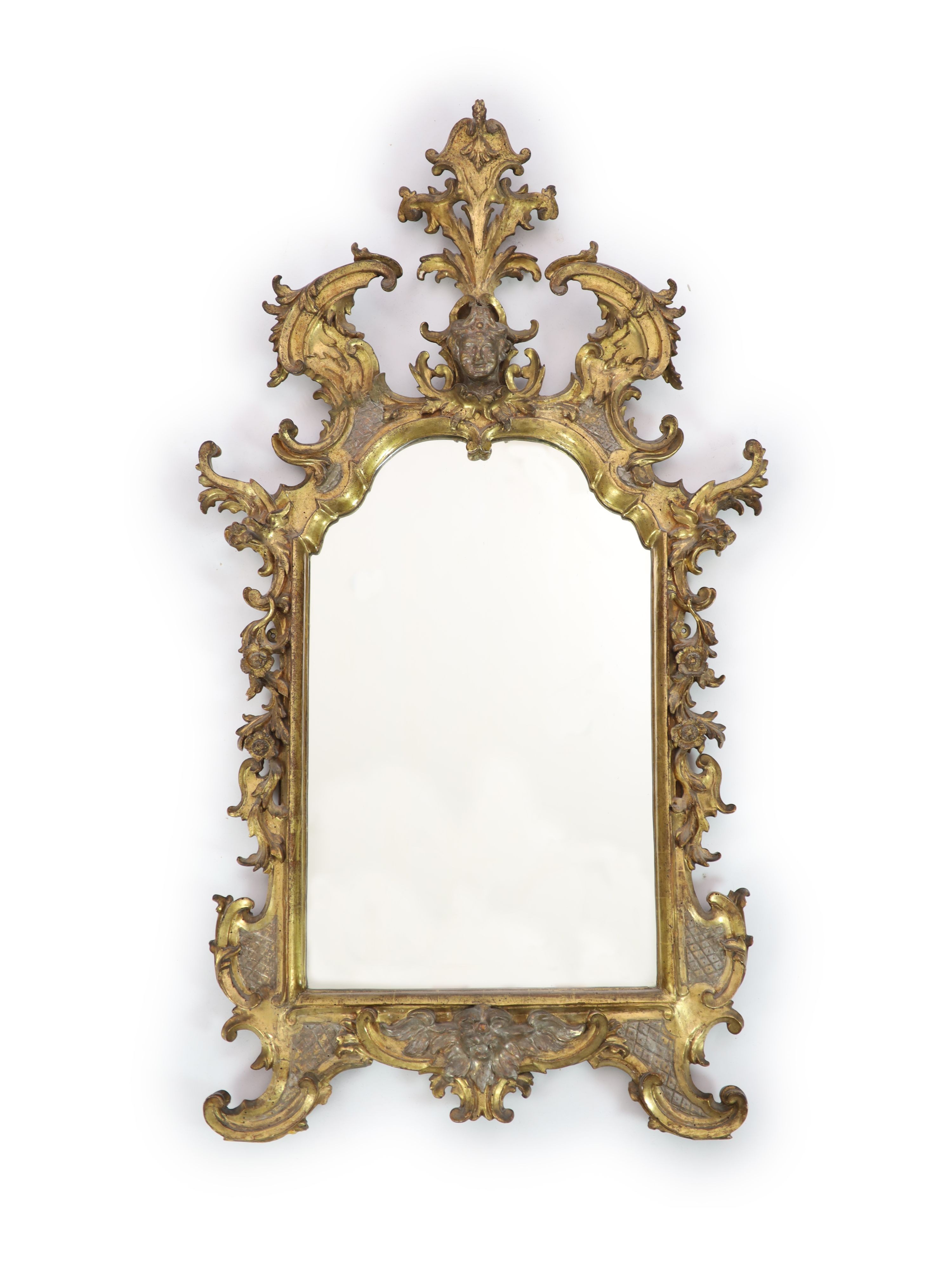 An 18th century Florentine giltwood wall mirror, W.78cm H.140cm                                                                                                                                                             