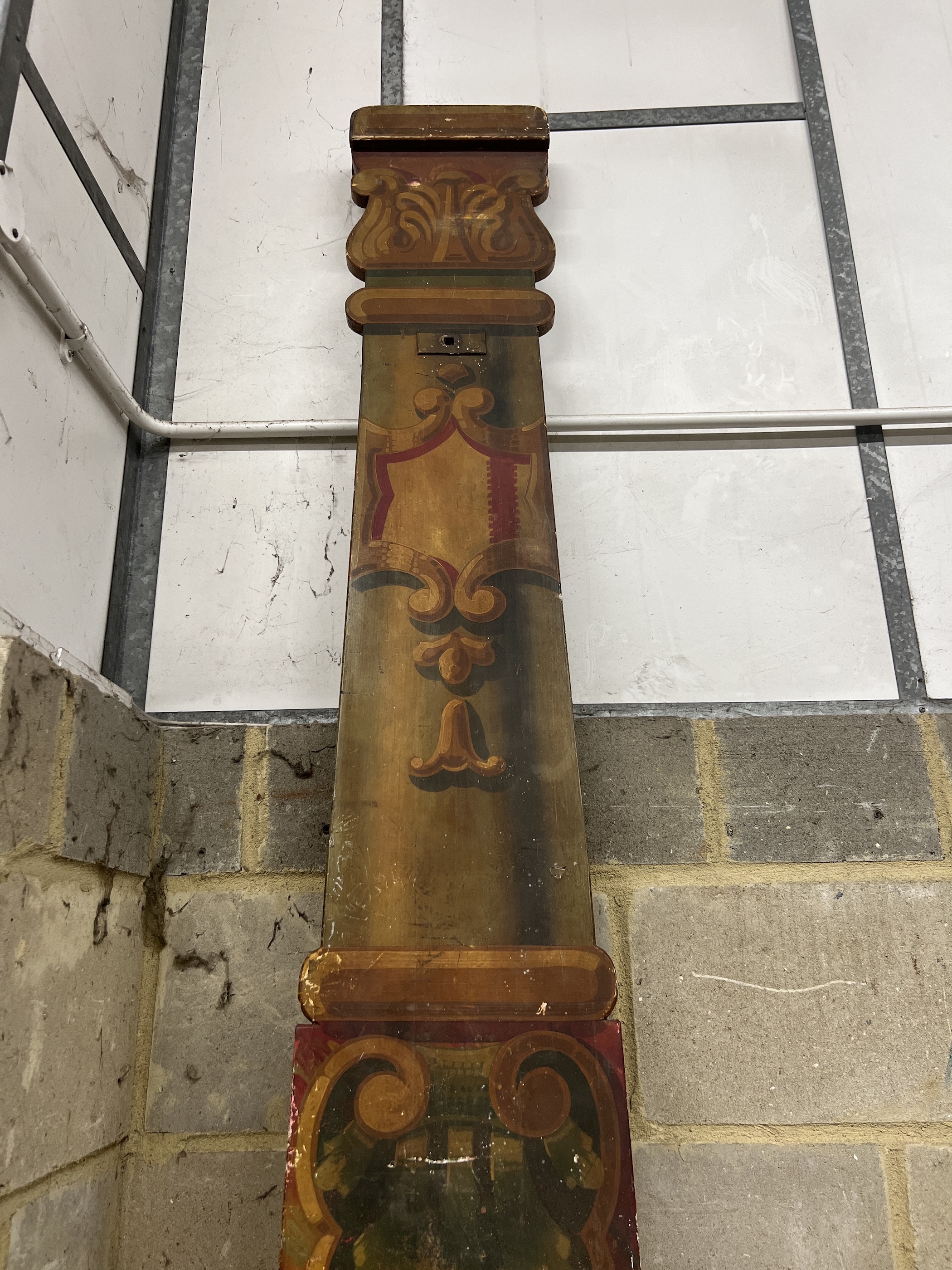 A pair of painted wood fairground columns, width 26cm, height 310cm                                                                                                                                                         