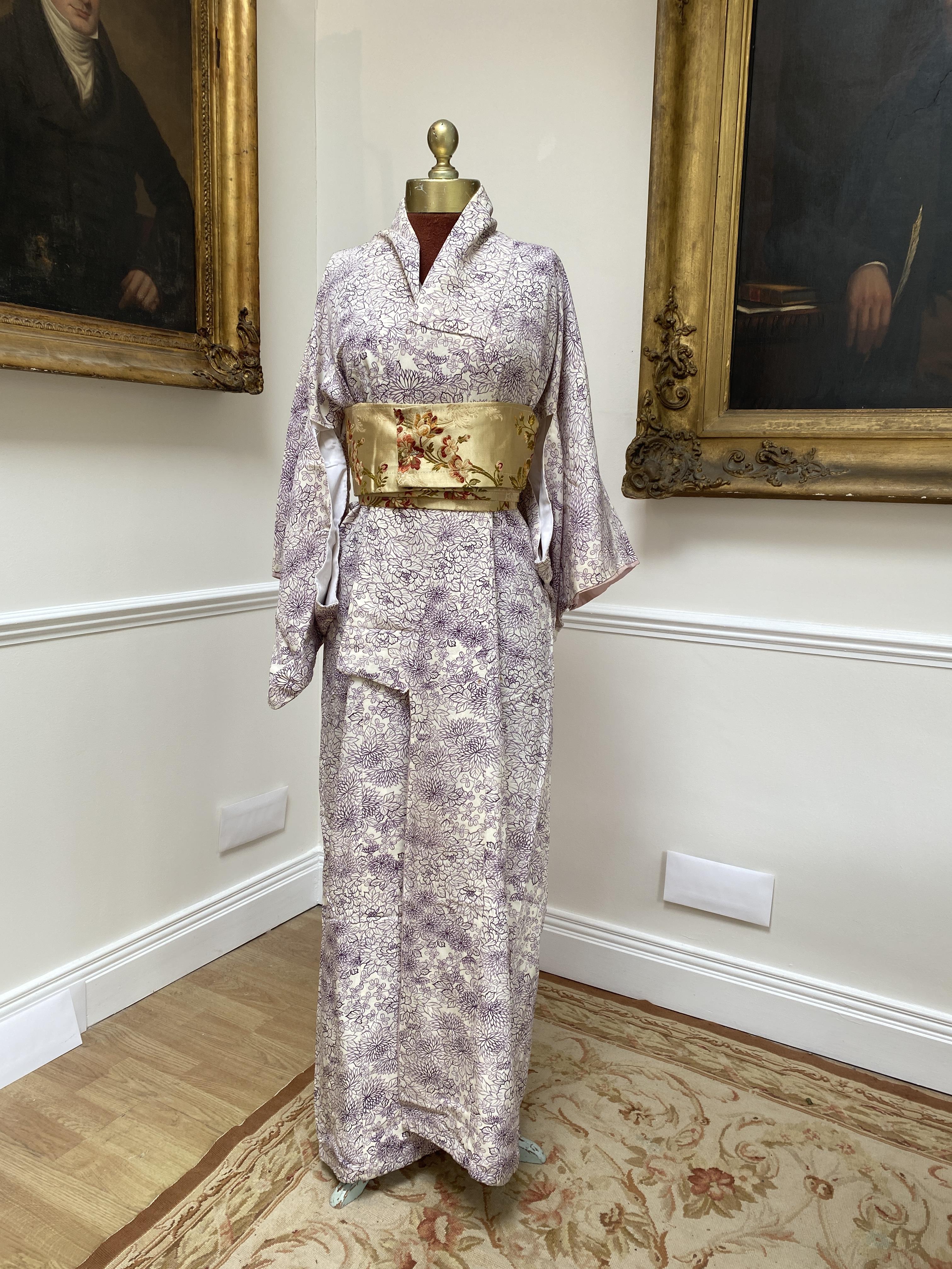 A lady’s Kimono in lilac floral pattern and obi                                                                                                                                                                             