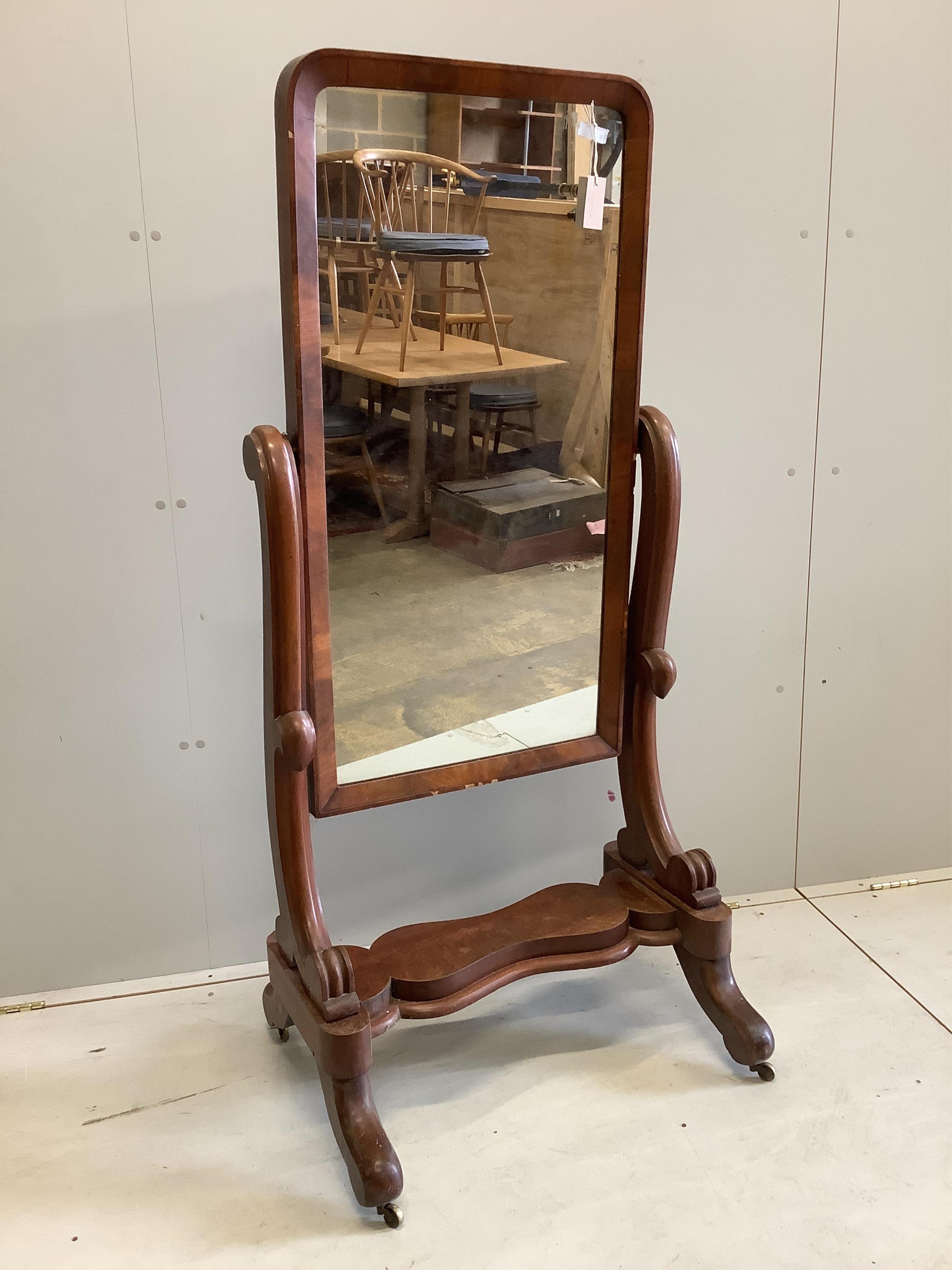 A Victorian mahogany cheval mirror, width 68cm, height 152cm. Condition - fair                                                                                                                                              