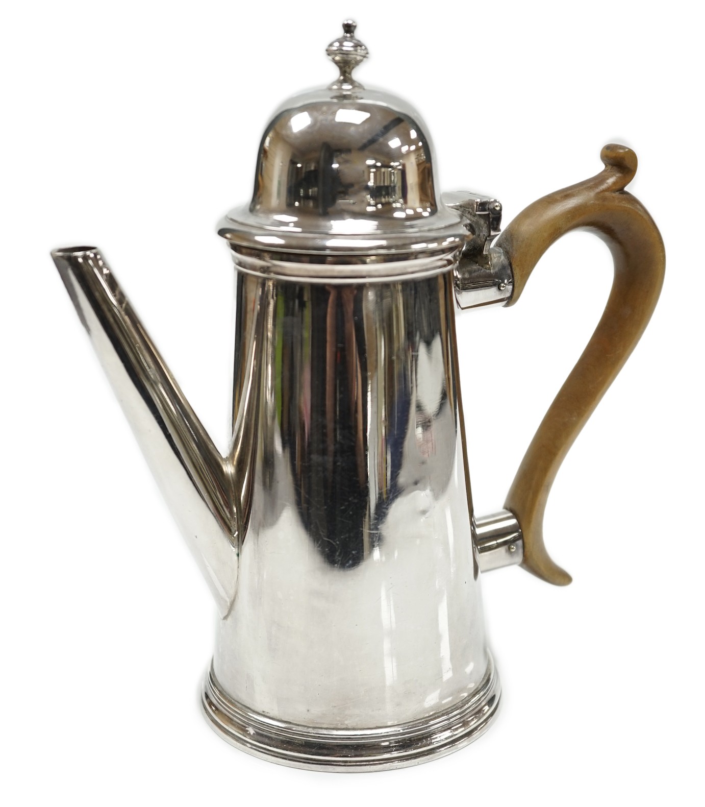 A late Victorian silver bachelor's coffee pot, by Charles Stuart Harris, London, 1896, height 18.8cm, gross weight 11.9oz.                                                                                                  
