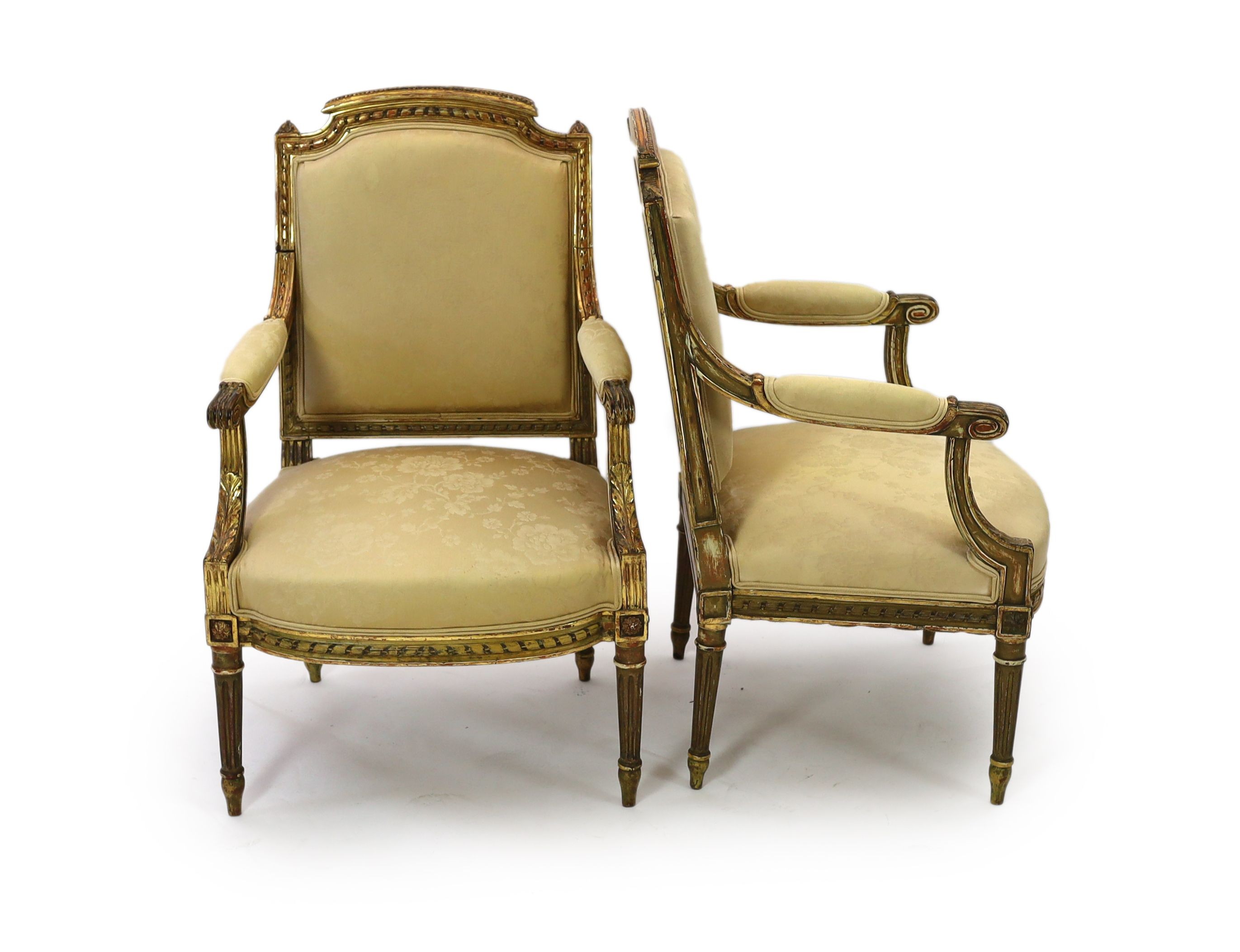 A good pair of 19th century French gilt wood elbow chairs 101 cm high, 62cm wide.                                                                                                                                           