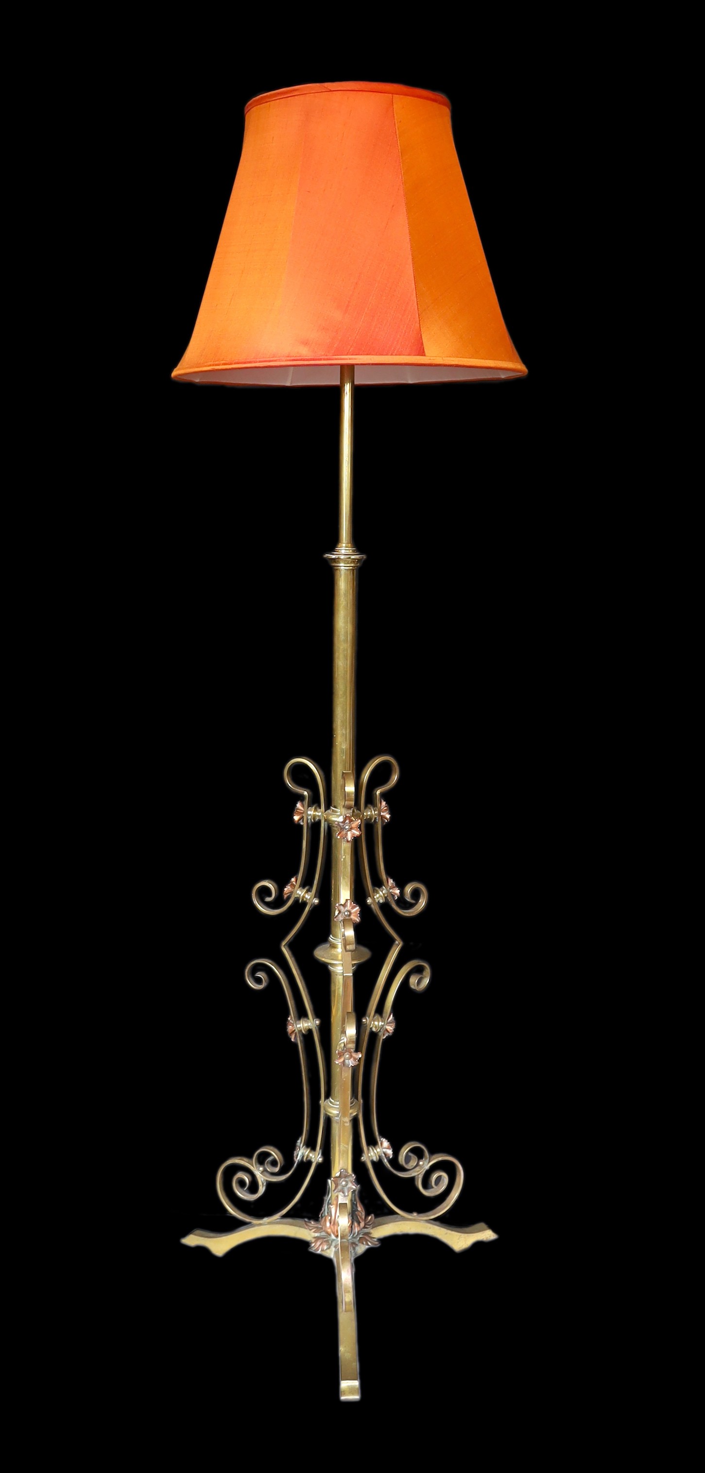 A late 19th century English brass and copper telescopic lamp standard, converted to electricity, height 148cm. width of base 50cm.                                                                                          