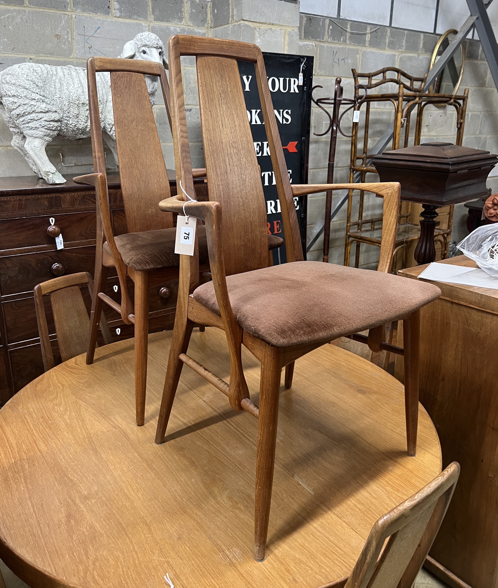 A set of five mid century Niels Koefoed Danish teak 'Eva' dining chairs, two with arms, width 47cm, height 96cm                                                                                                             