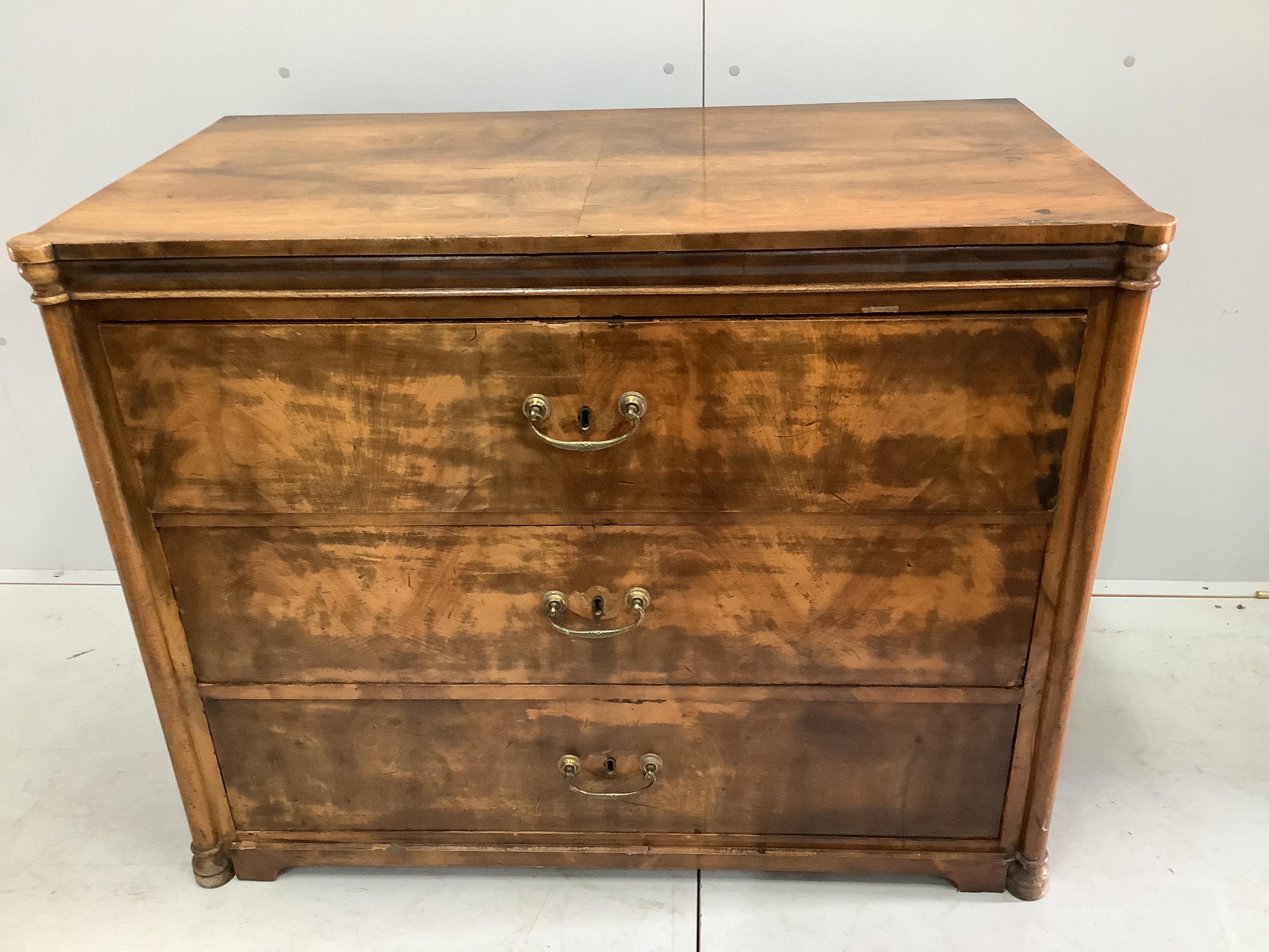 A 19th century Continental walnut three drawer commode, width 110cm, depth 58cm, height 87cm                                                                                                                                