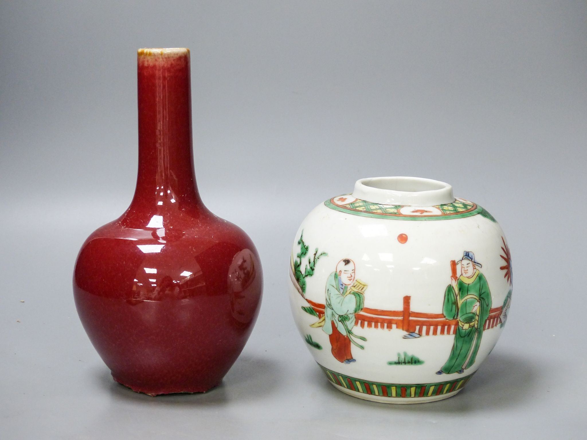 A Chinese famille verte jar and a sang de boeuf vase                                                                                                                                                                        