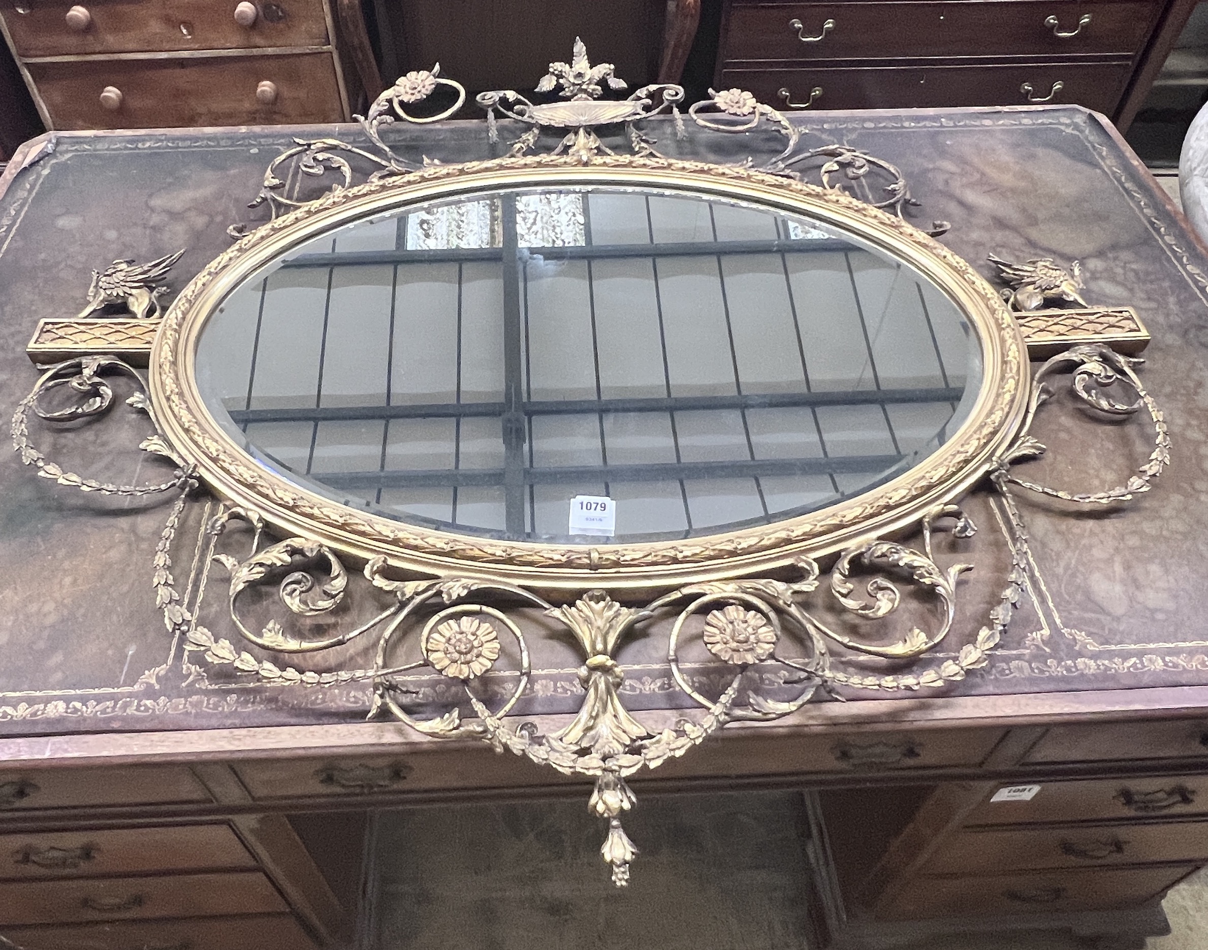 An Adam revival giltwood and gesso wall mirror, width 119cm, height 115cm                                                                                                                                                   